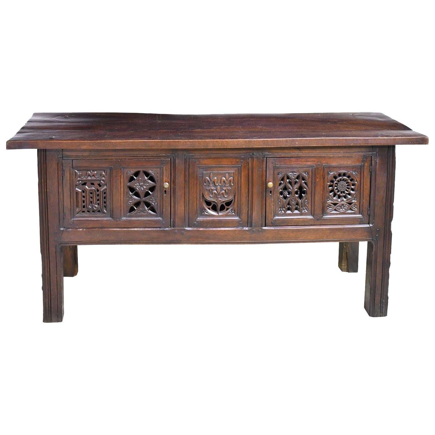 English Tudor-Style Library Table in Oak with Antique Carved Elements For Sale