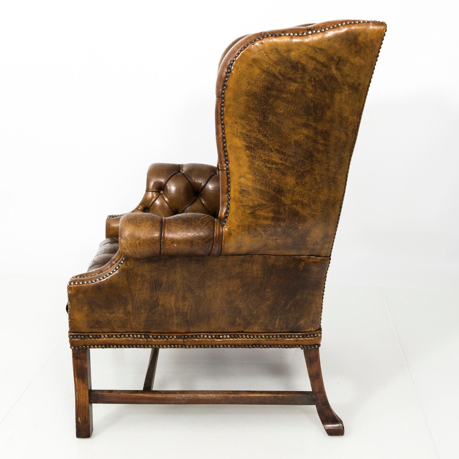 tufted leather wingback chair