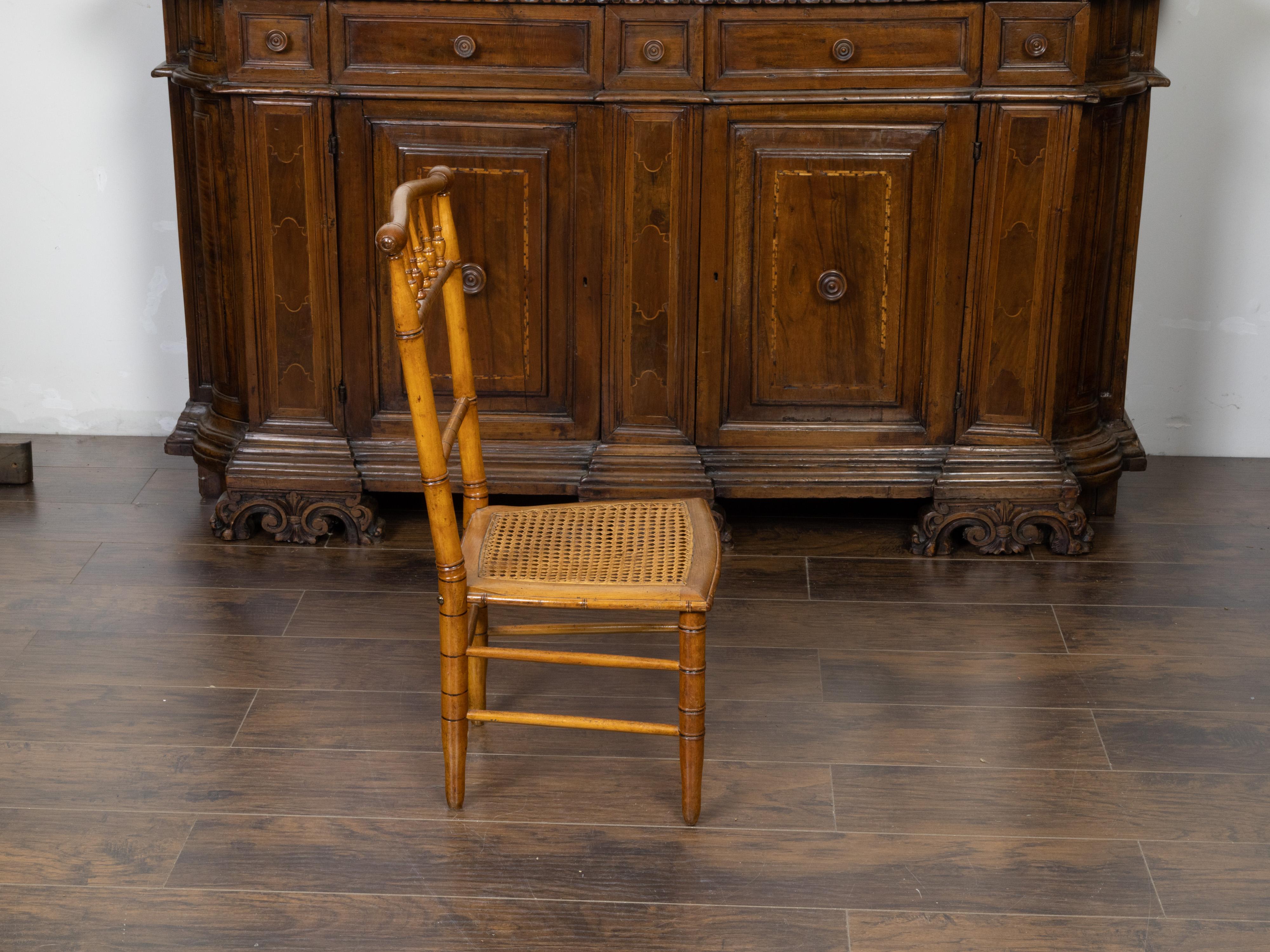English Turn of the Century 1900s Bamboo Slipper Chair with Cane Seat In Good Condition For Sale In Atlanta, GA