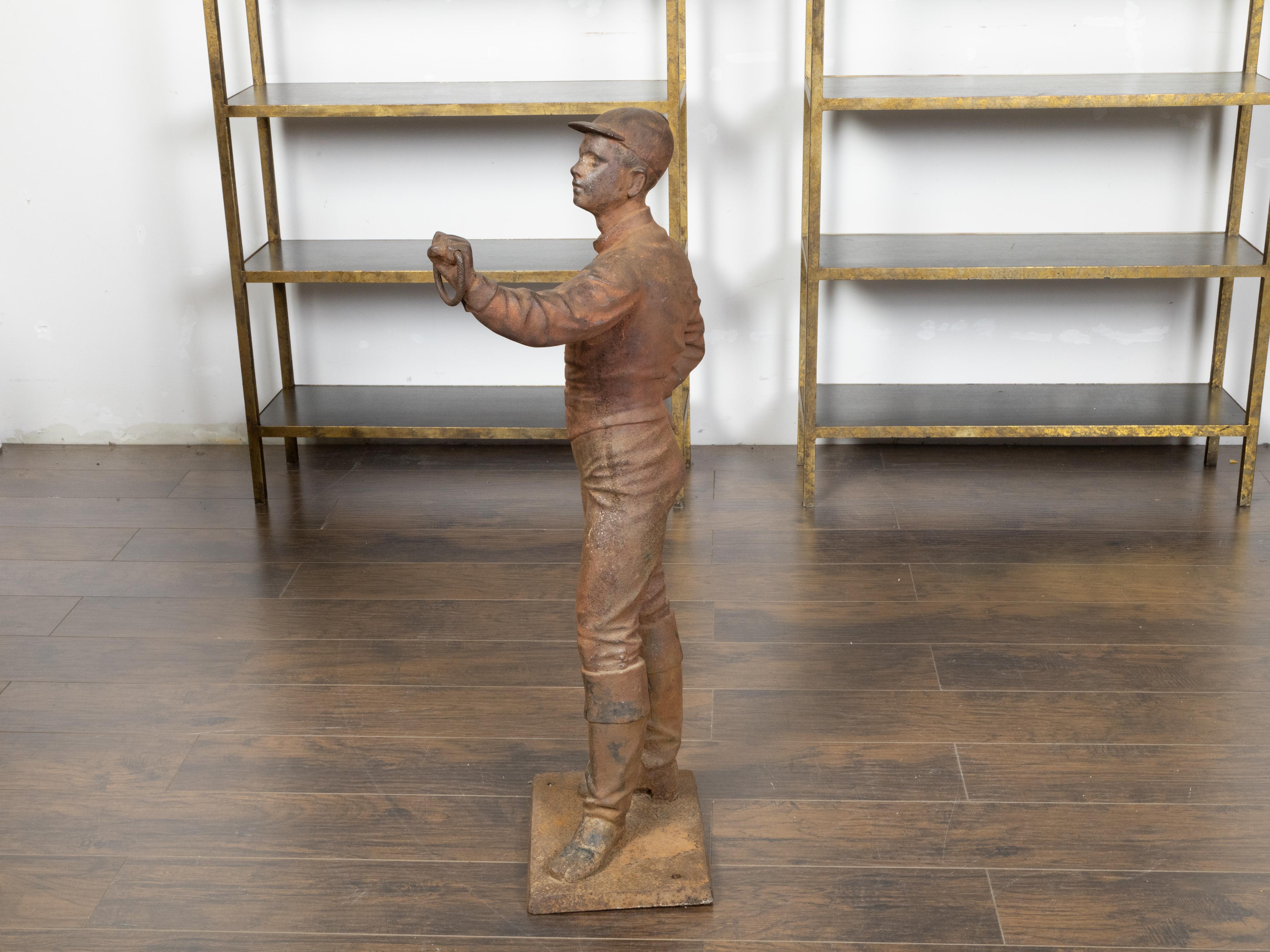Patinated English Turn of the Century Iron Sculpture of a Jockey with Weathered Patina For Sale