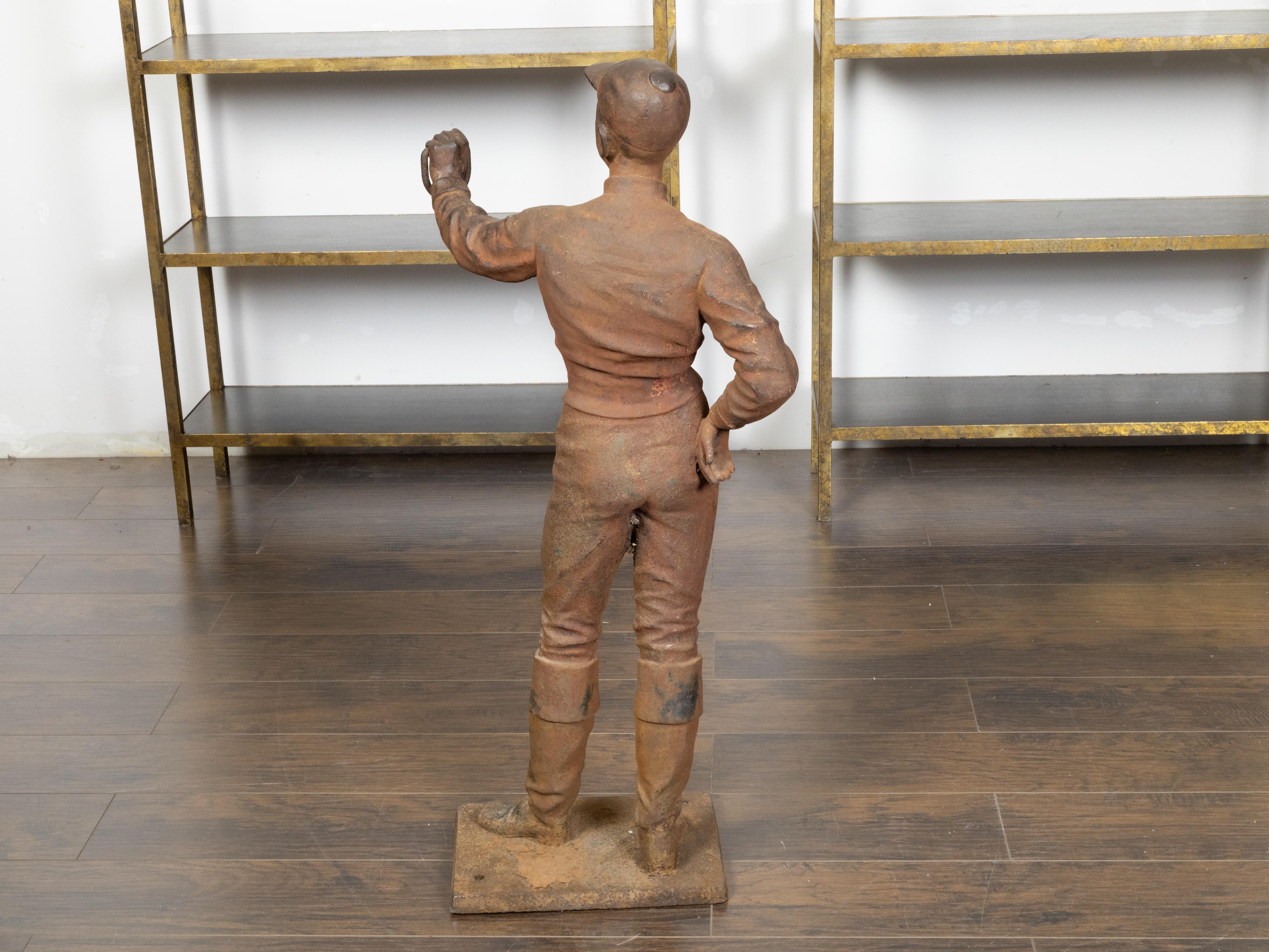 English Turn of the Century Iron Sculpture of a Jockey with Weathered Patina In Good Condition For Sale In Atlanta, GA