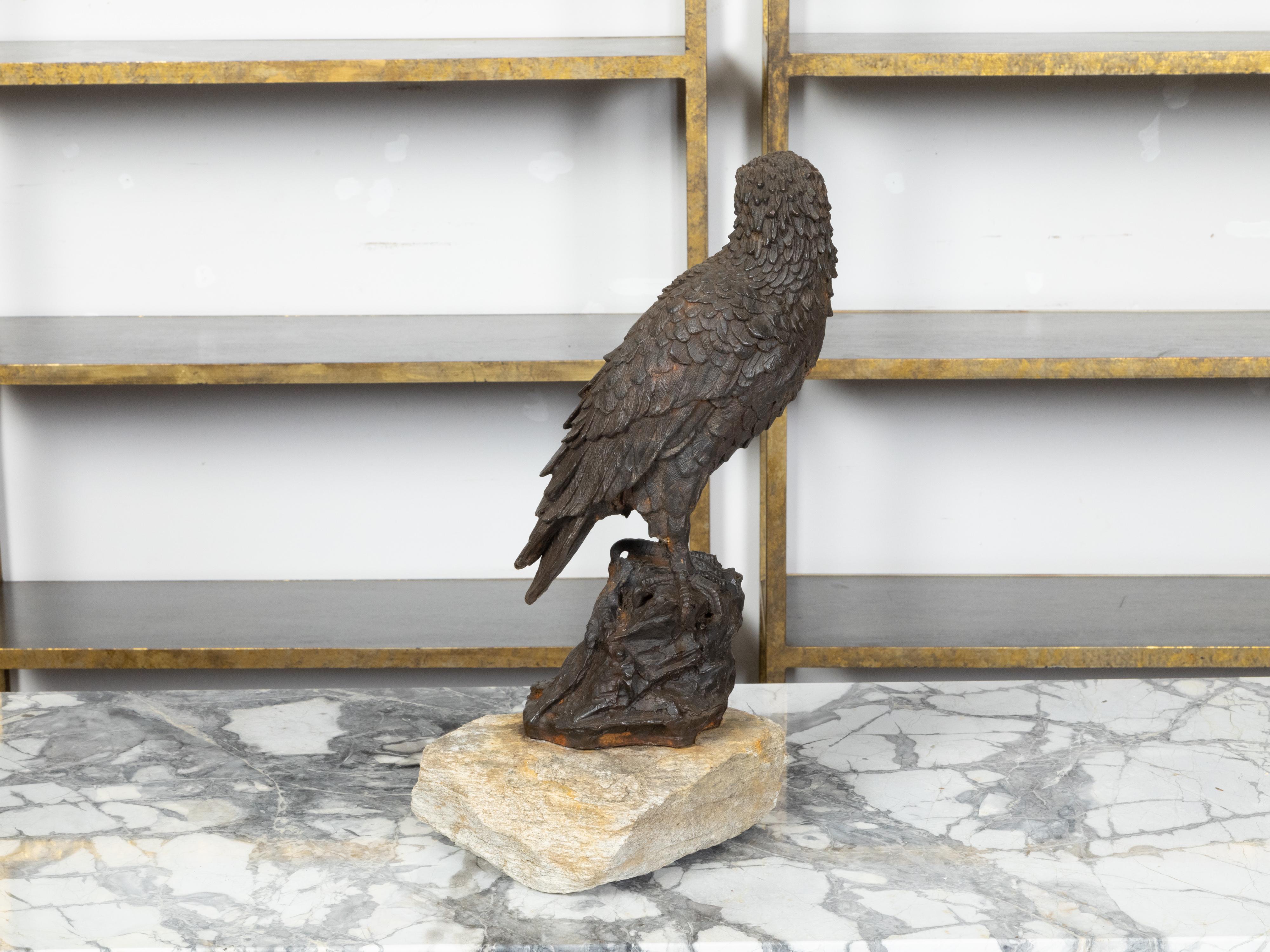 English Turn of the Century Iron Sculpture of an Eagle Perched on a Rock In Good Condition For Sale In Atlanta, GA
