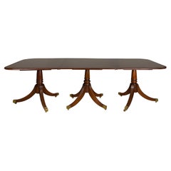 Antique English Turn of the Century Mahogany Extension Dining Table with Quadripod Base