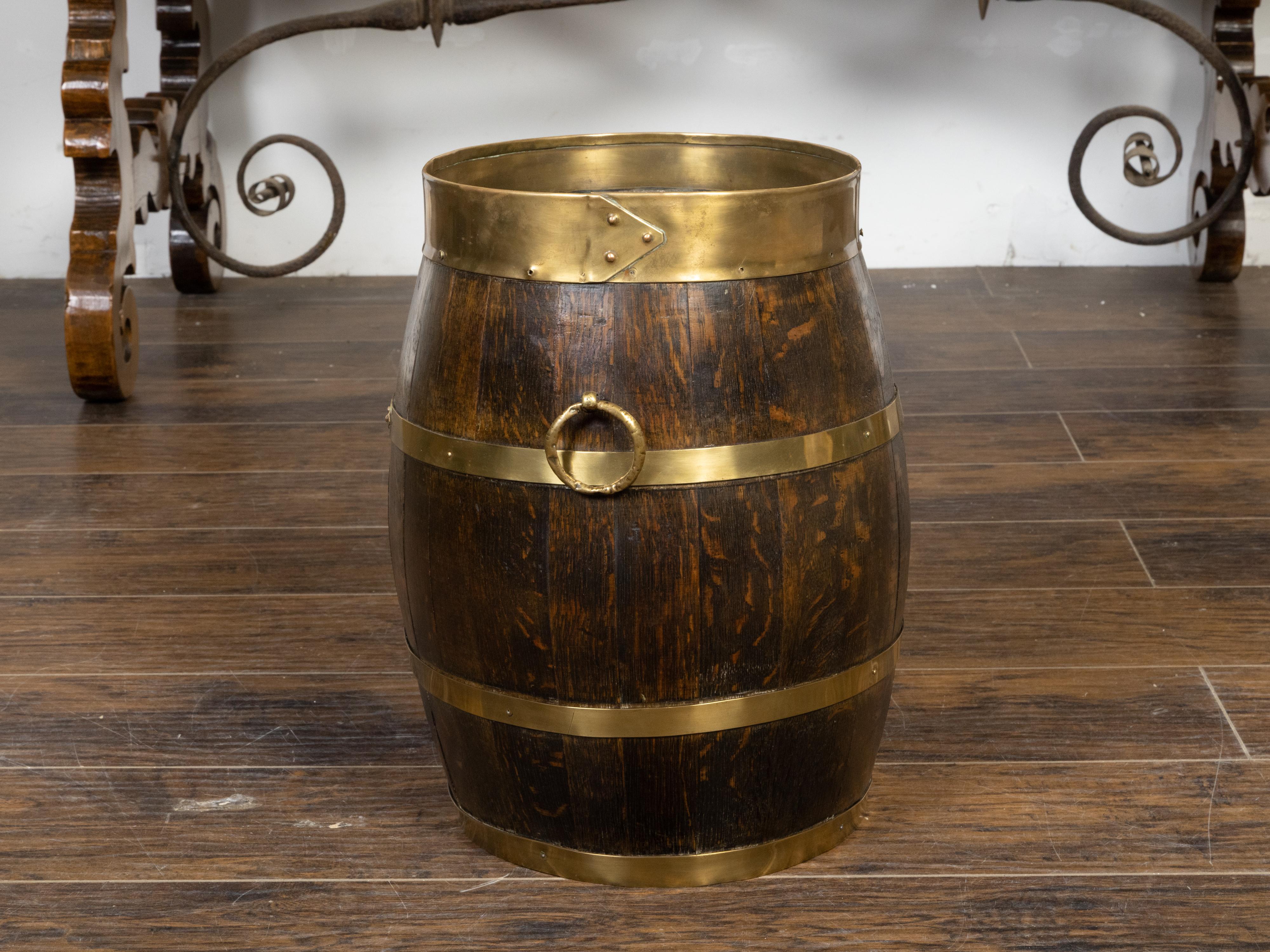 Rustic English Turn of the Century Oak Barrel with Brass Braces, circa 1900 For Sale