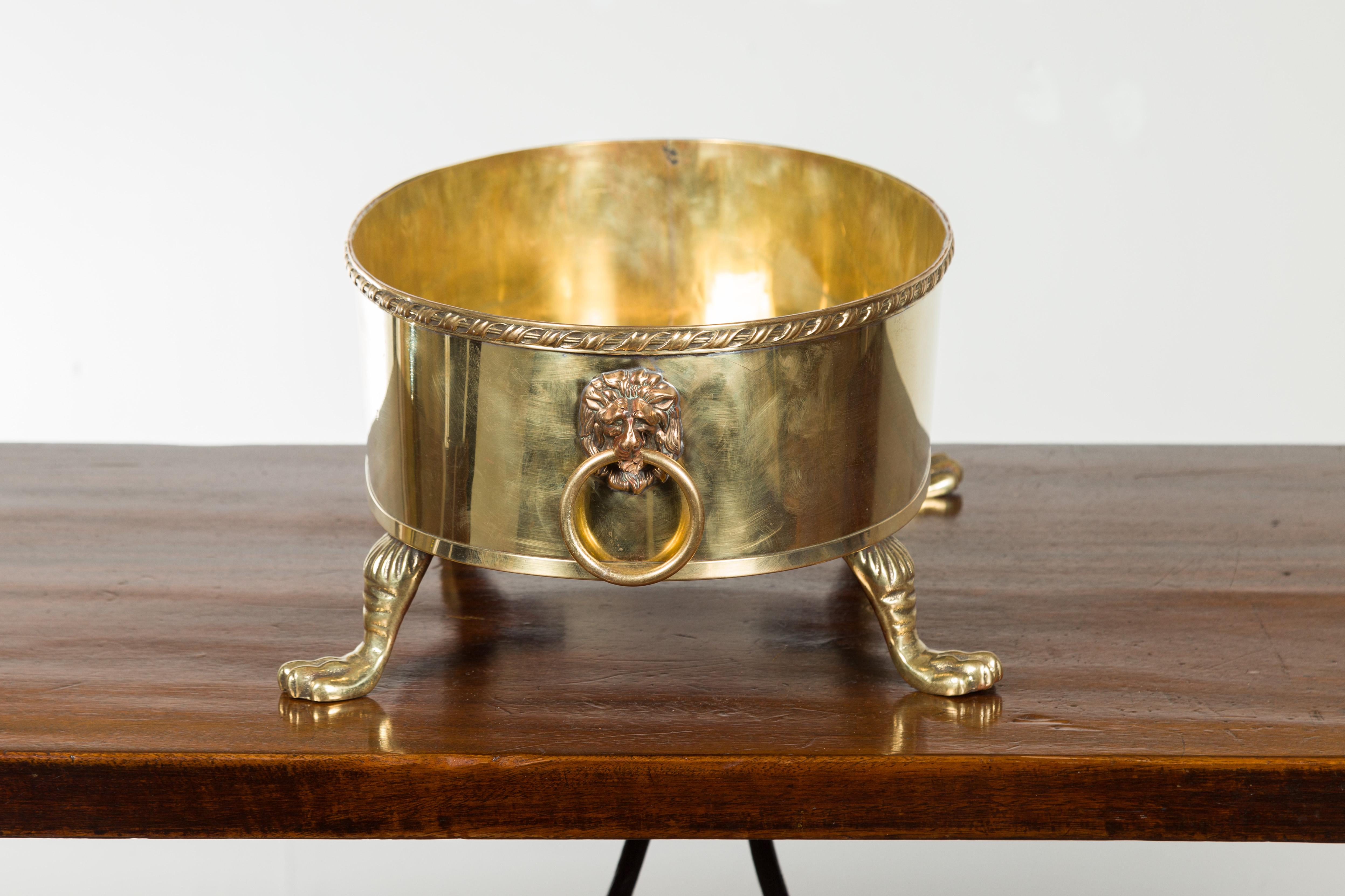 English Turn of the Century Oval Brass Cachepot with Lion Heads and Paw Feet 6
