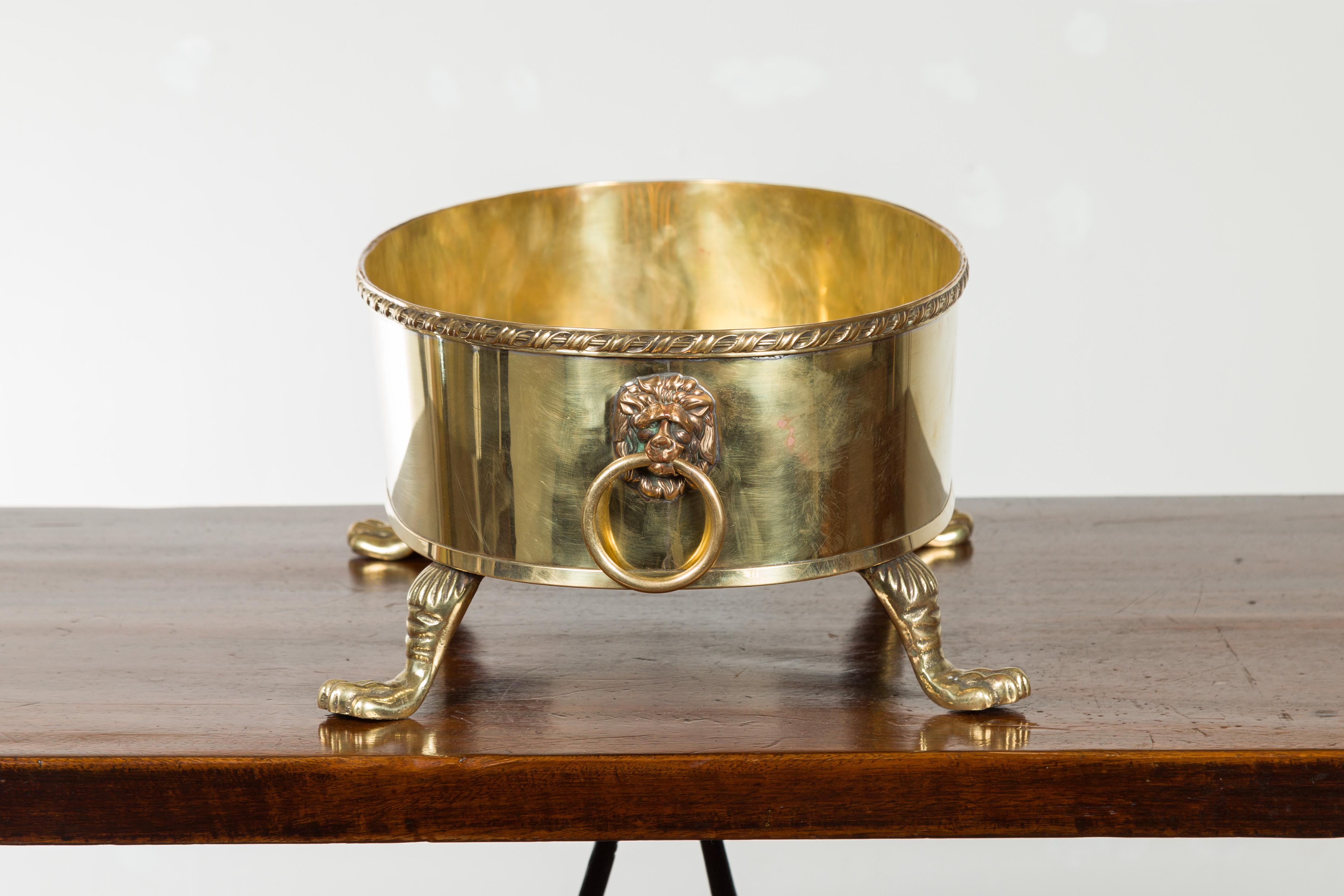 English Turn of the Century Oval Brass Cachepot with Lion Heads and Paw Feet 9
