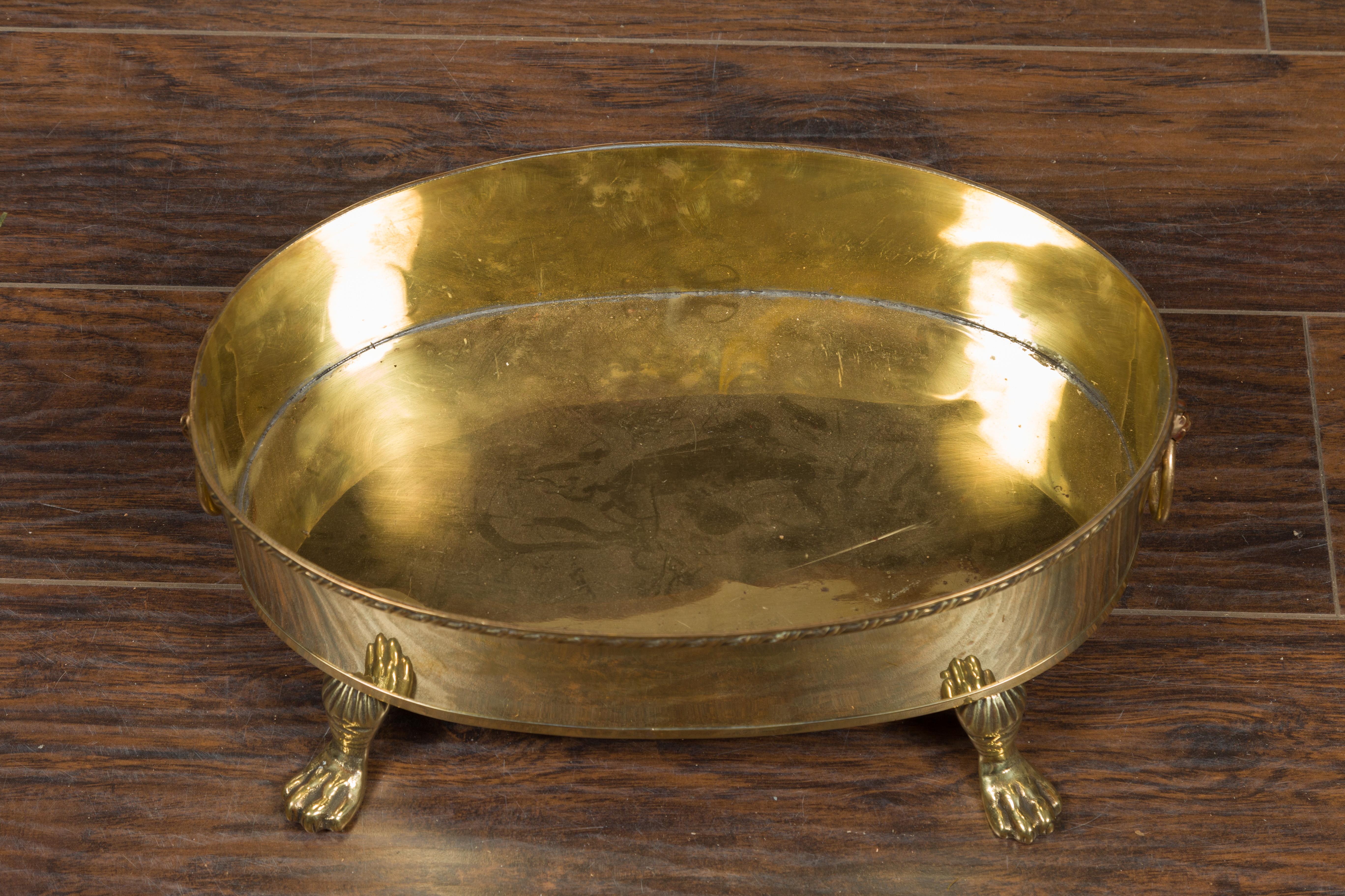 English Turn of the Century Oval Brass Cachepot with Lion Heads and Paw Feet 10