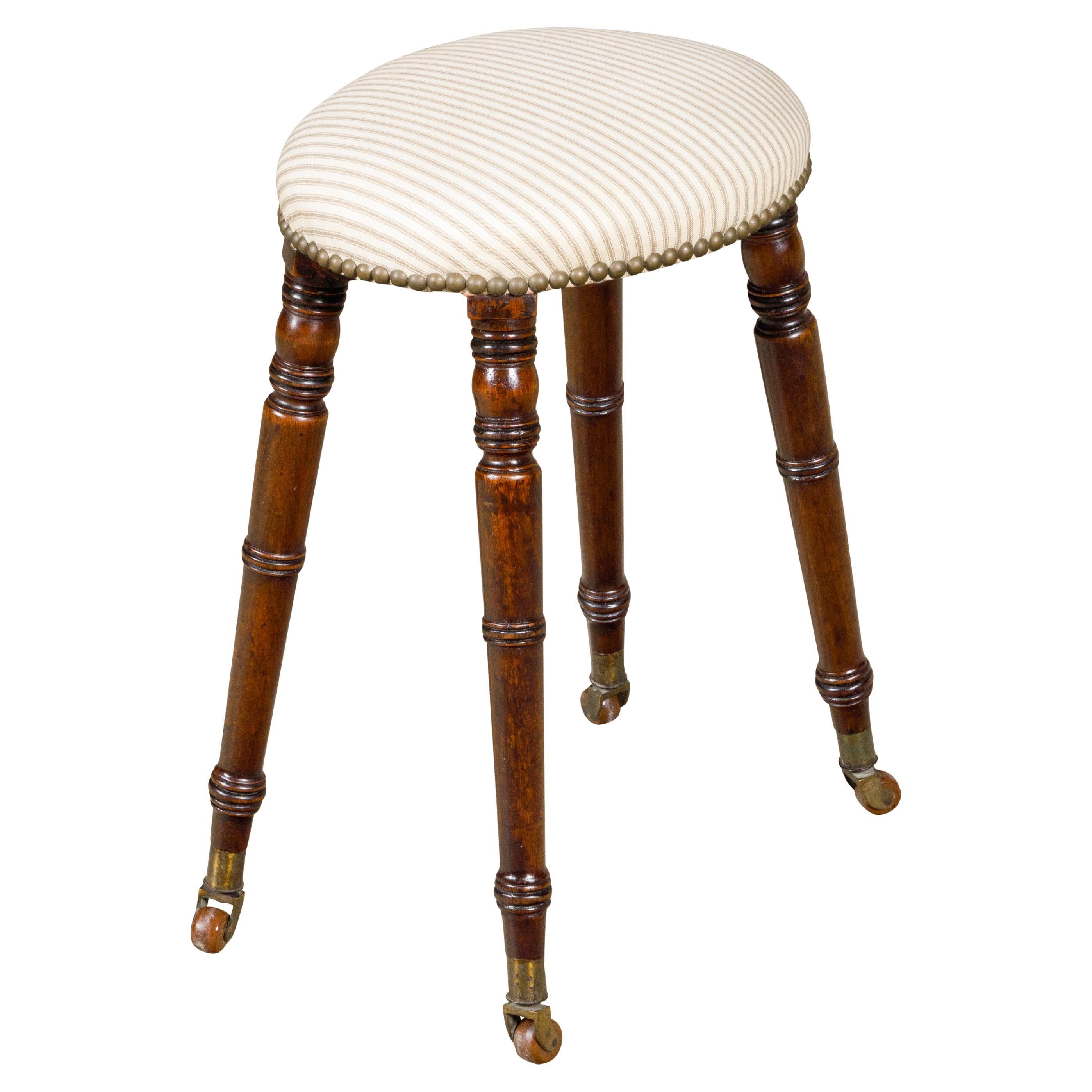 English Turned Oak 19th Century Stool on Casters with Oval Upholstered Seat