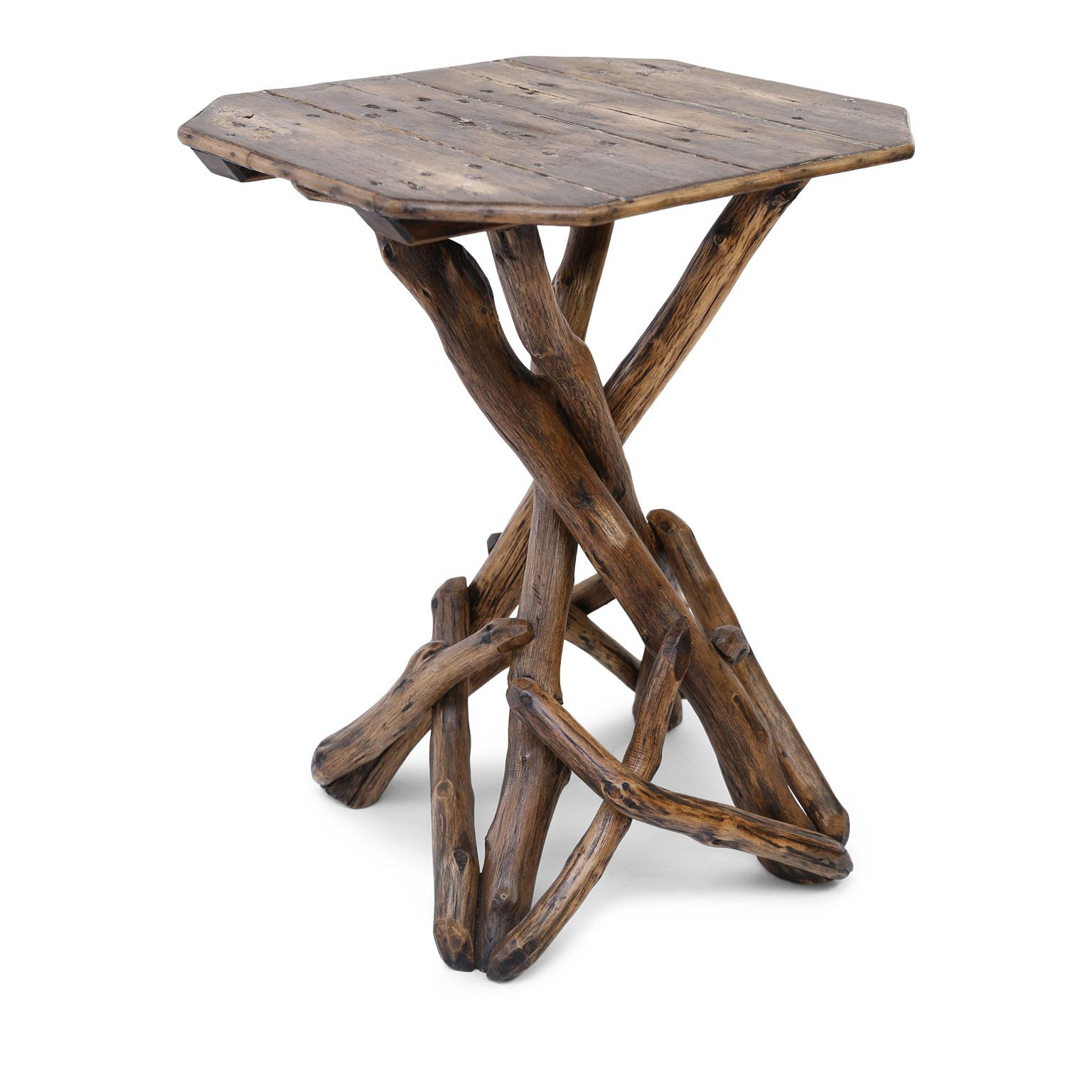 English twig table, created circa 1875 to furnish a rustic summer house. In very good, solid, stabile and strong condition. Perfect to serve as a decorative and unusual side table or, as intended, in a summer house or conservatory.