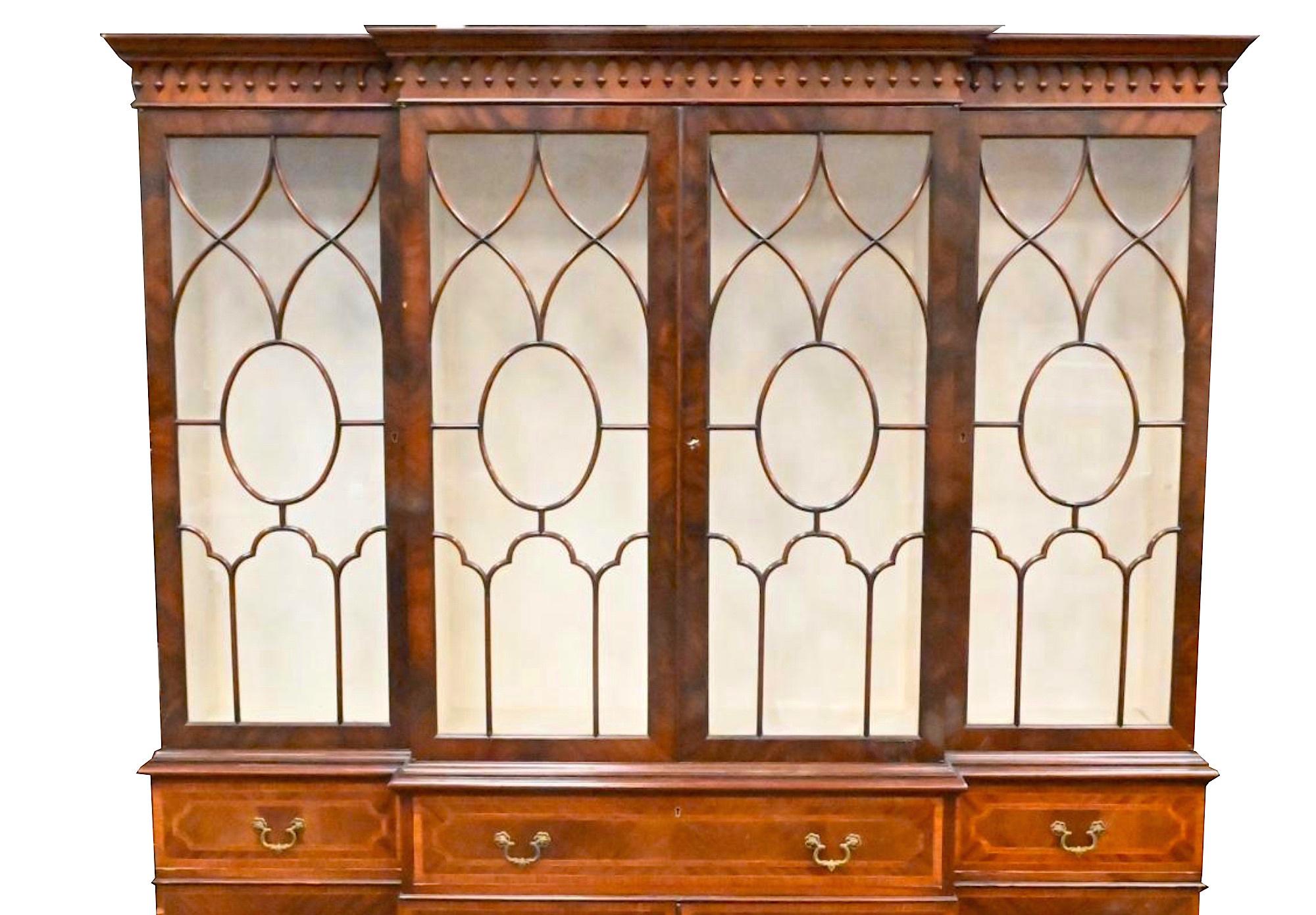 Enhance your home's elegance with this Beautifully Crafted Two-Part Burl Mahogany Carved Wood China Display Cabinet or Bookcase, a piece of furniture that marries sophistication and functionality. The upper part of this magnificent cabinet features