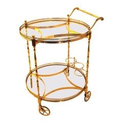 English Two-Tier Brass and Glass Bar Cart with Bottle Holders and Brass Wheels