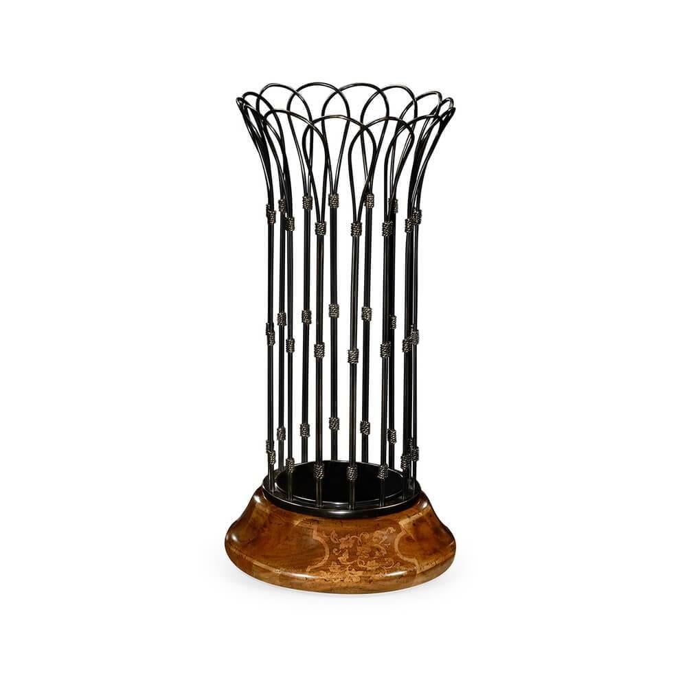 A beautiful tall stand that will carry copious amounts of walking sticks and umbrellas. Beautiful marquetry work to the base and carefully hand-applied brasswork all tied together with brass wire then patinated makes this stand the perfect accessory