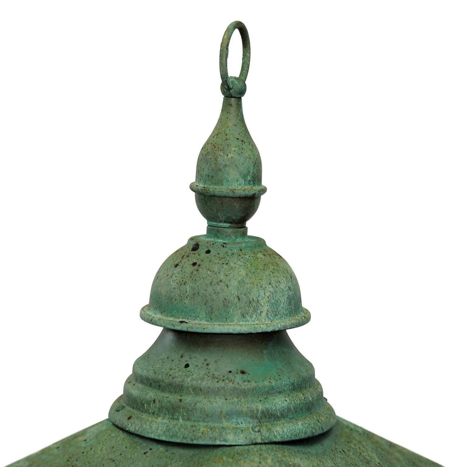 This is a beautifully charismatic English mid-19th century verdigris bronze Hanging Lantern, now converted to electricity, suitable for interior or exterior use. Complete with brass makers name plate, Stanstead Abbotts, D. W. WINDSOR, Hearts