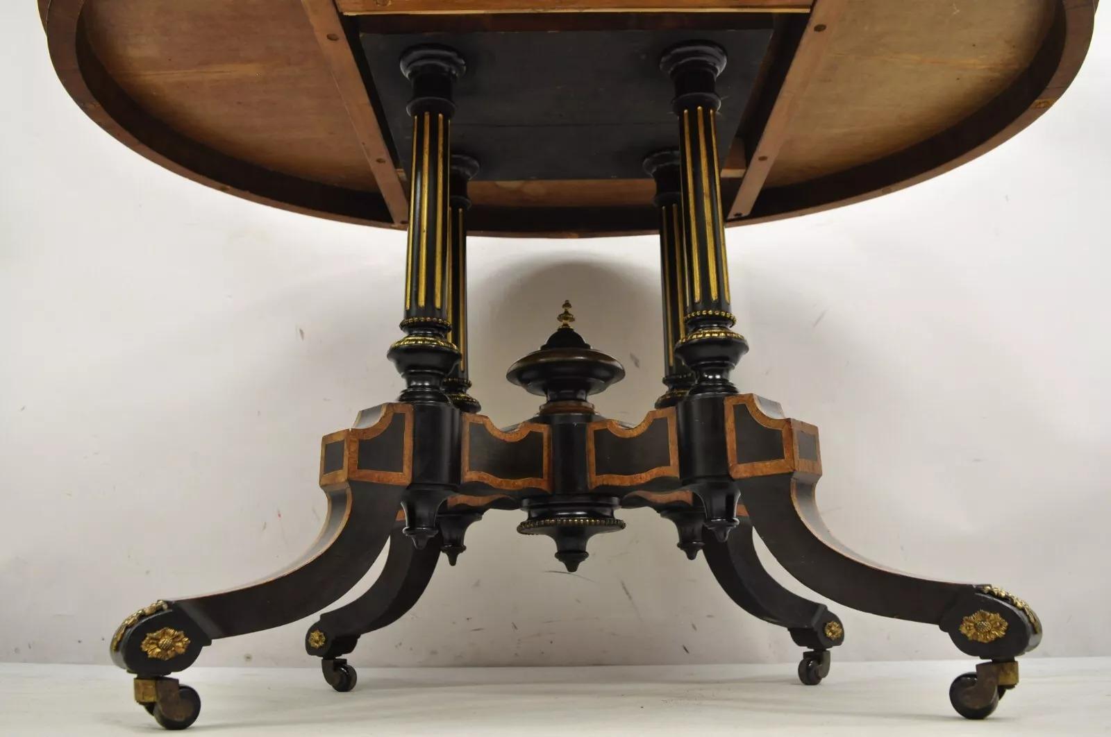 Victorien Table centrale ovale en ébène et ronce de noyer de l'époque victorienne anglaise Aesthetic Movement en vente