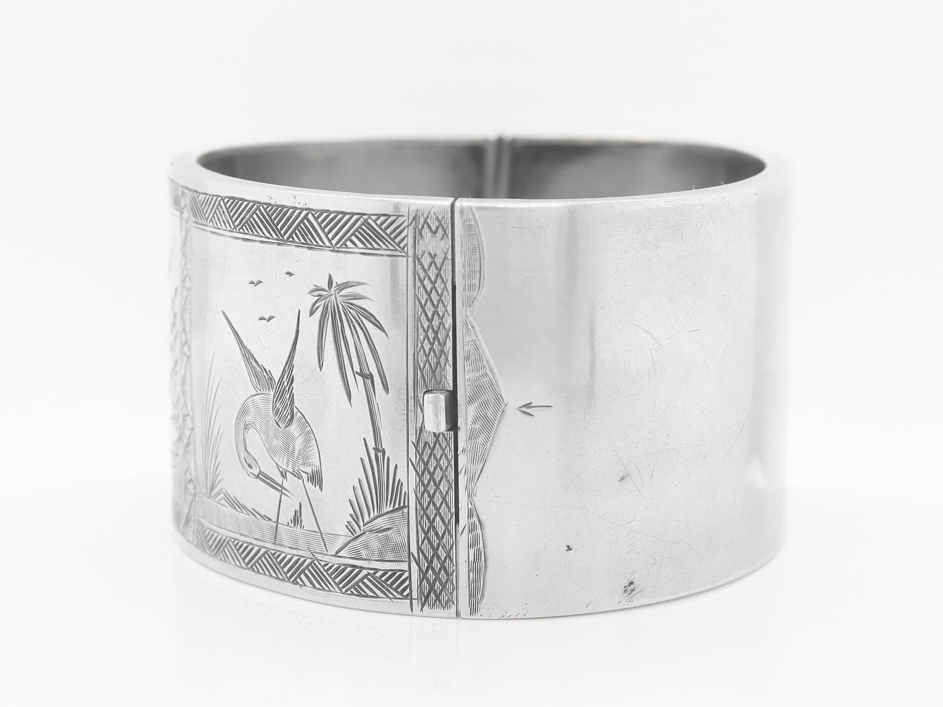 English Victorian Aesthetic Sterling Silver Bangle Bracelet with Scenes of Birds For Sale 1
