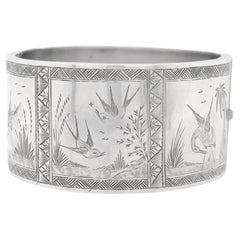 English Victorian Aesthetic Sterling Silver Bangle Bracelet with Scenes of Birds