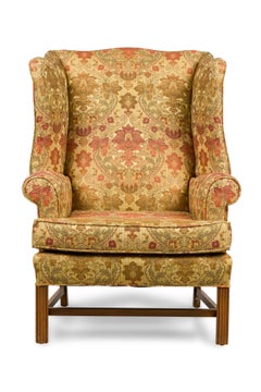 English Victorian Beige Wingback Chair With Various Colored Floral Pattern