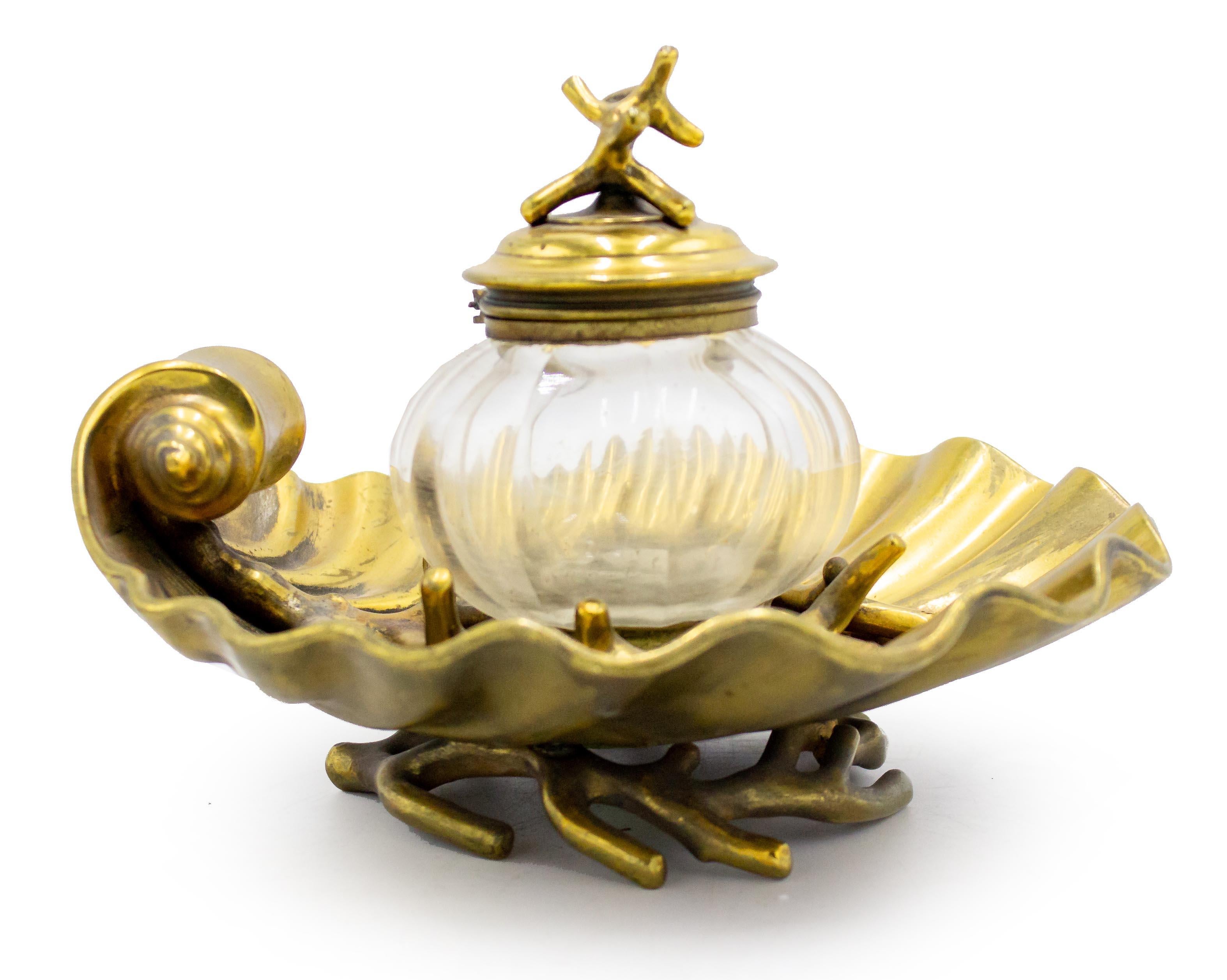 English Victorian brass and crystal shell shaped inkwell with coral design details.
 