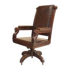 Fauteuil pivotant anglais victorien en cuir brun