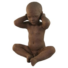 English Victorian Cast Iron Seated Nude Child Garden Sculpture