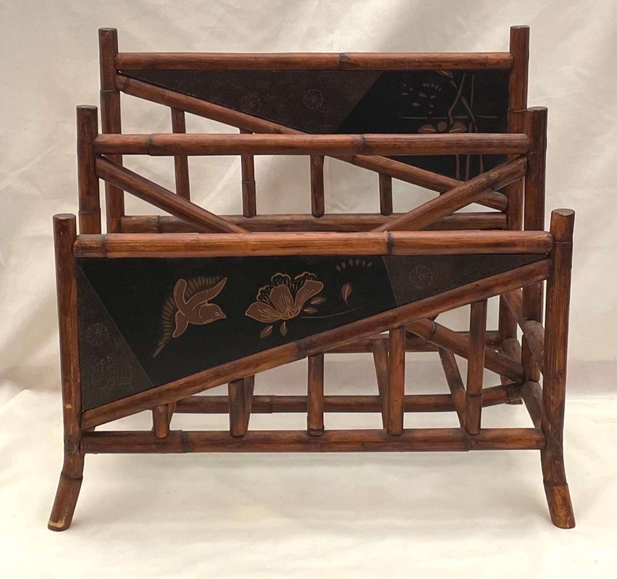 English Victorian Chinoiserie bamboo Canterbury magazine holder

English bamboo canterbury or magazine stand made in the chinoiserie revival taste of the early 20th century. An original piece with three graduated tiers create two compartments.