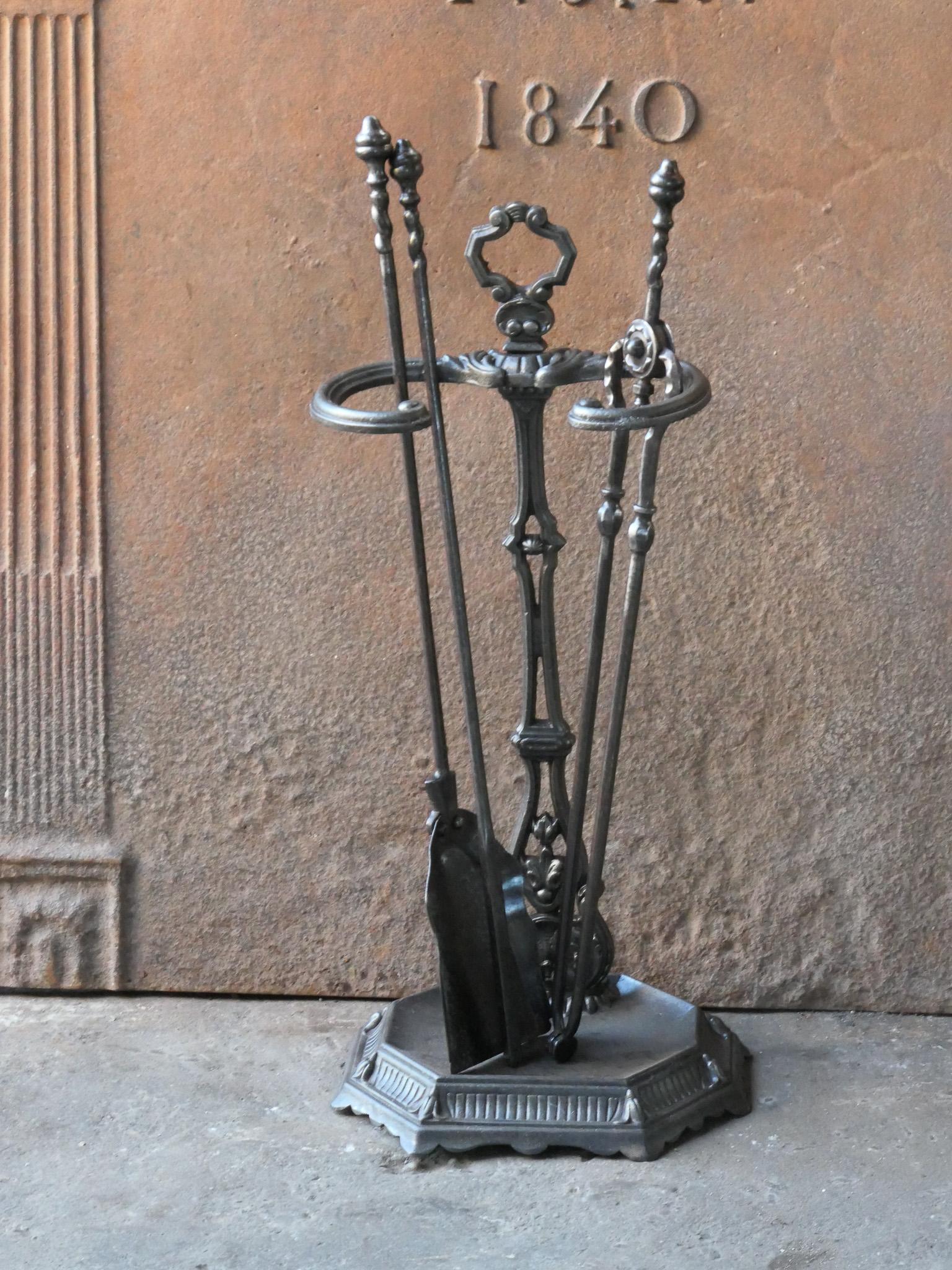 19th century English Victorian period fireplace toolset. The tools are made of wrought iron and the stand of cast iron. The toolset consists of tongs, shovel, poker and stand. The condition is good.








.