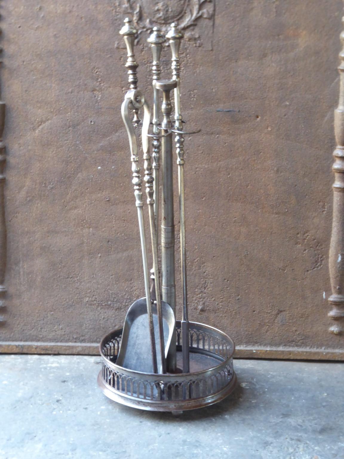 Set of three fire tools and an elegant stand made of wrought iron. It is in a good condition and is fully functional.








 
