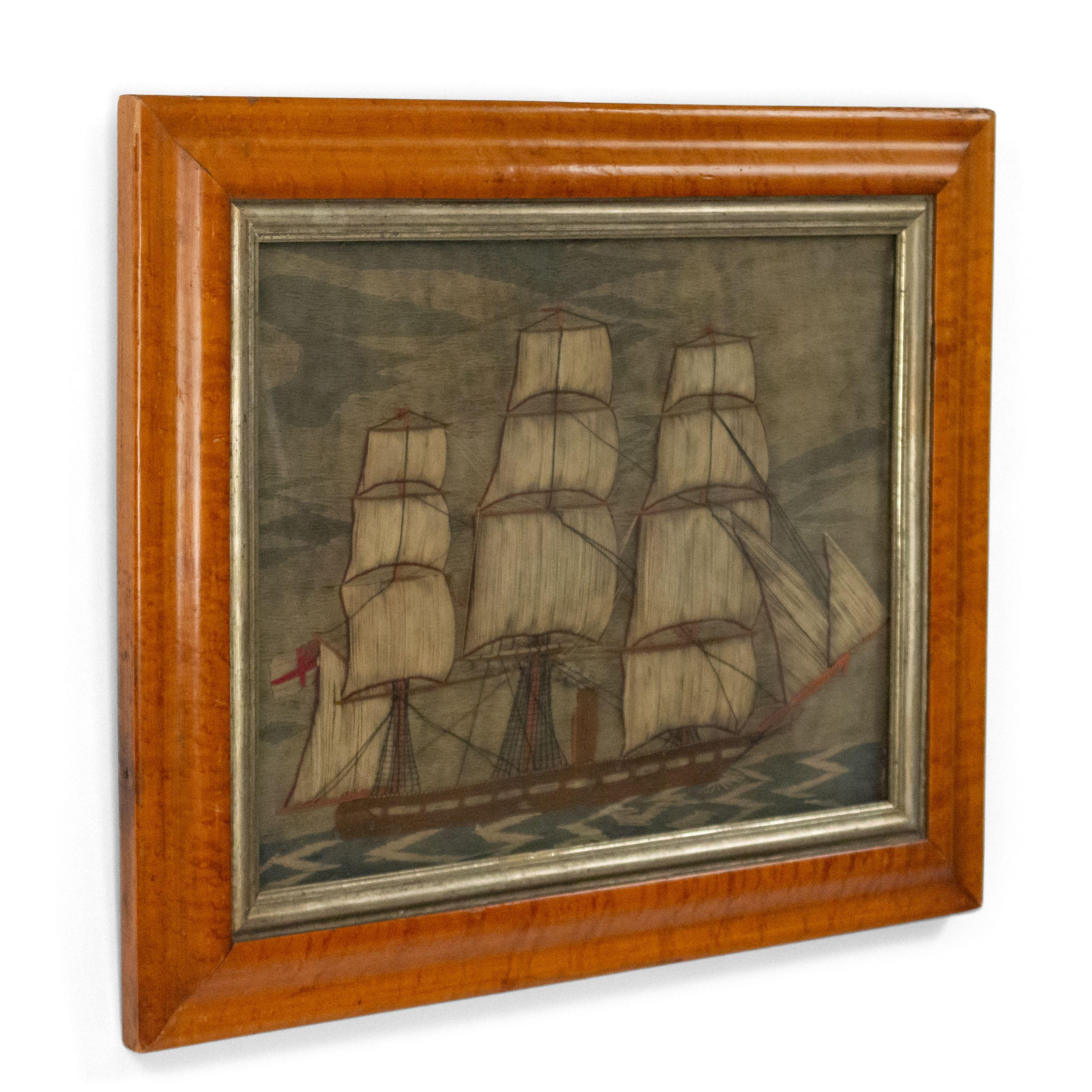 English Country Victorian maple framed embroidered woolwork clipper ship with brown and white hulls.
 