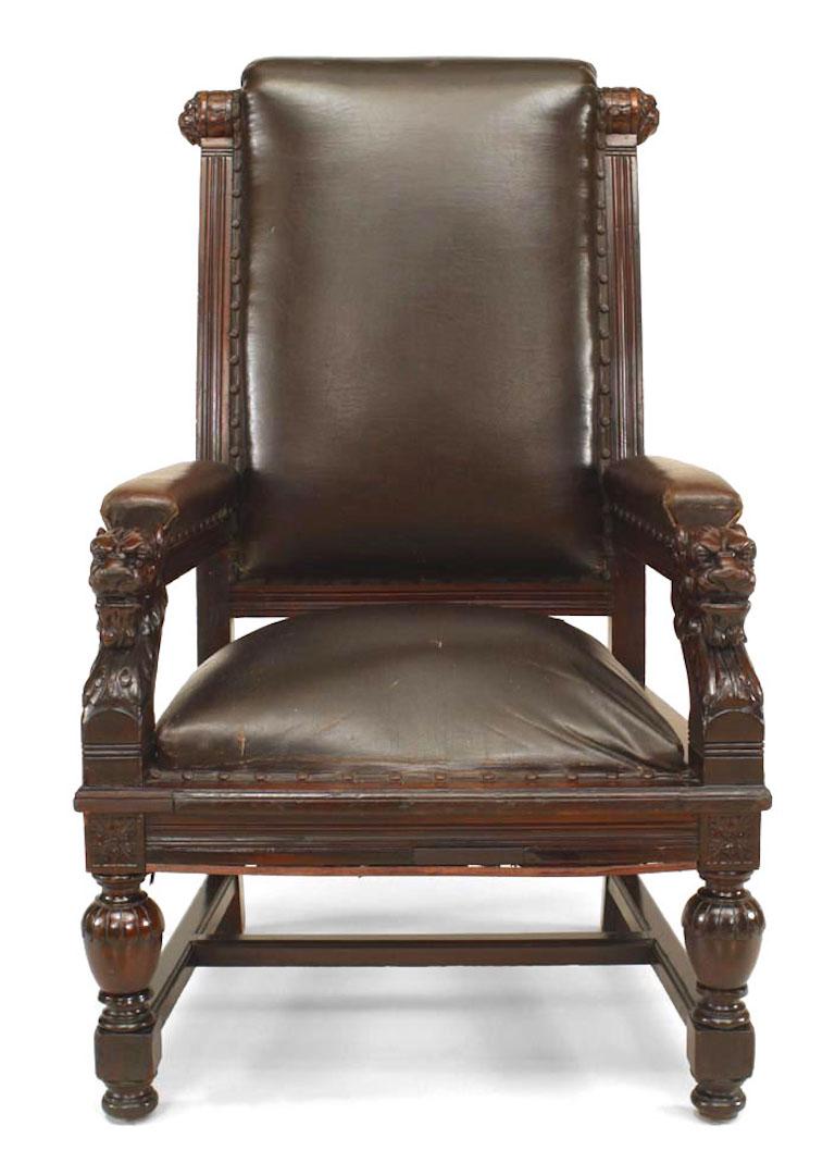 2 Similar English Victorian high back brown leather judges chairs with lion carving on arms. (PRICED EACH)
