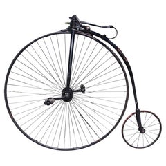 Bicicleta Americana de Ruedas Altas / Penny-Farthing con Asiento de Cuero. Alrededor de 1870
