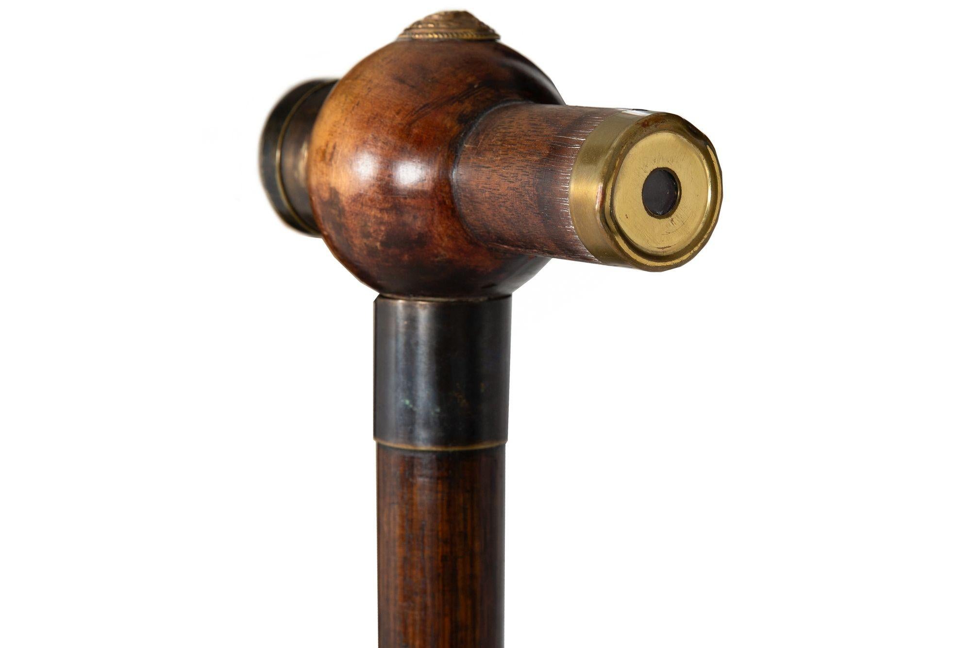 KALEIDOSCOPE GADGET CANE
Probably English, circa late 19th century

37 1/2