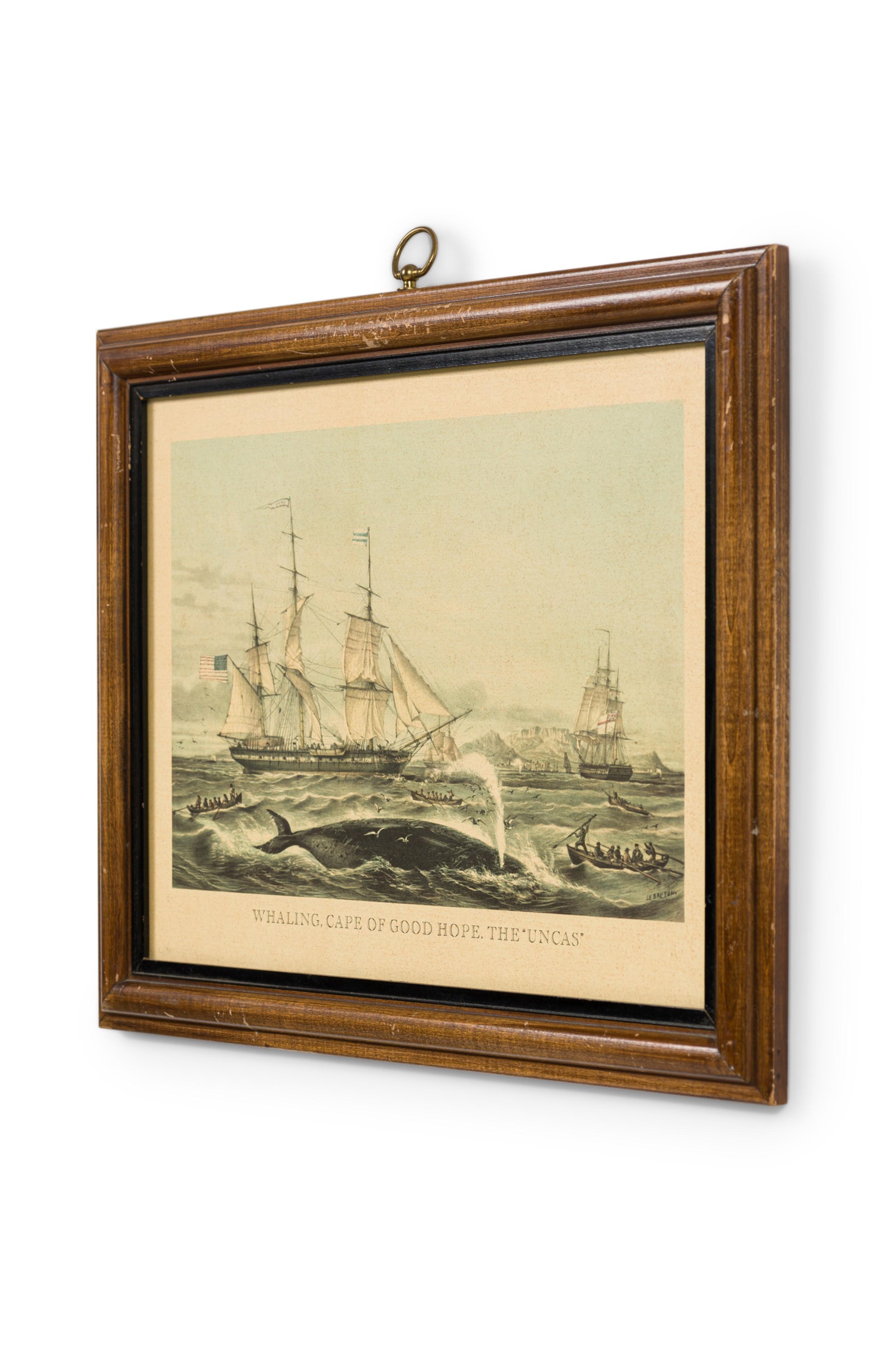 Lithographie anglaise victorienne d'une scène de mer avec un bateau à voile et des groupes de chasseurs en chaloupe attaquant une baleine dans un cadre en chêne avec une bordure noire titrée : \