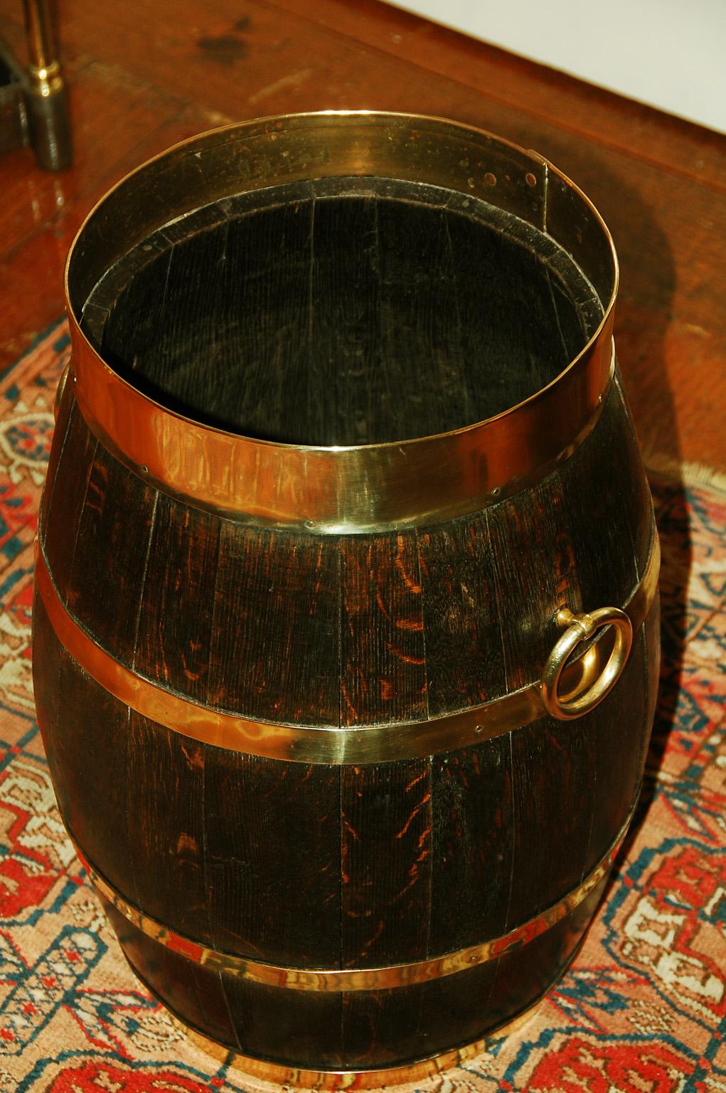 English Victorian brass bound oak coopered barrel umbrella stand or stick stand, with side ring handles. The oak in this barrel retains a lovely patination which is highlighted by the substantial brass banding that is well polished. The last photo