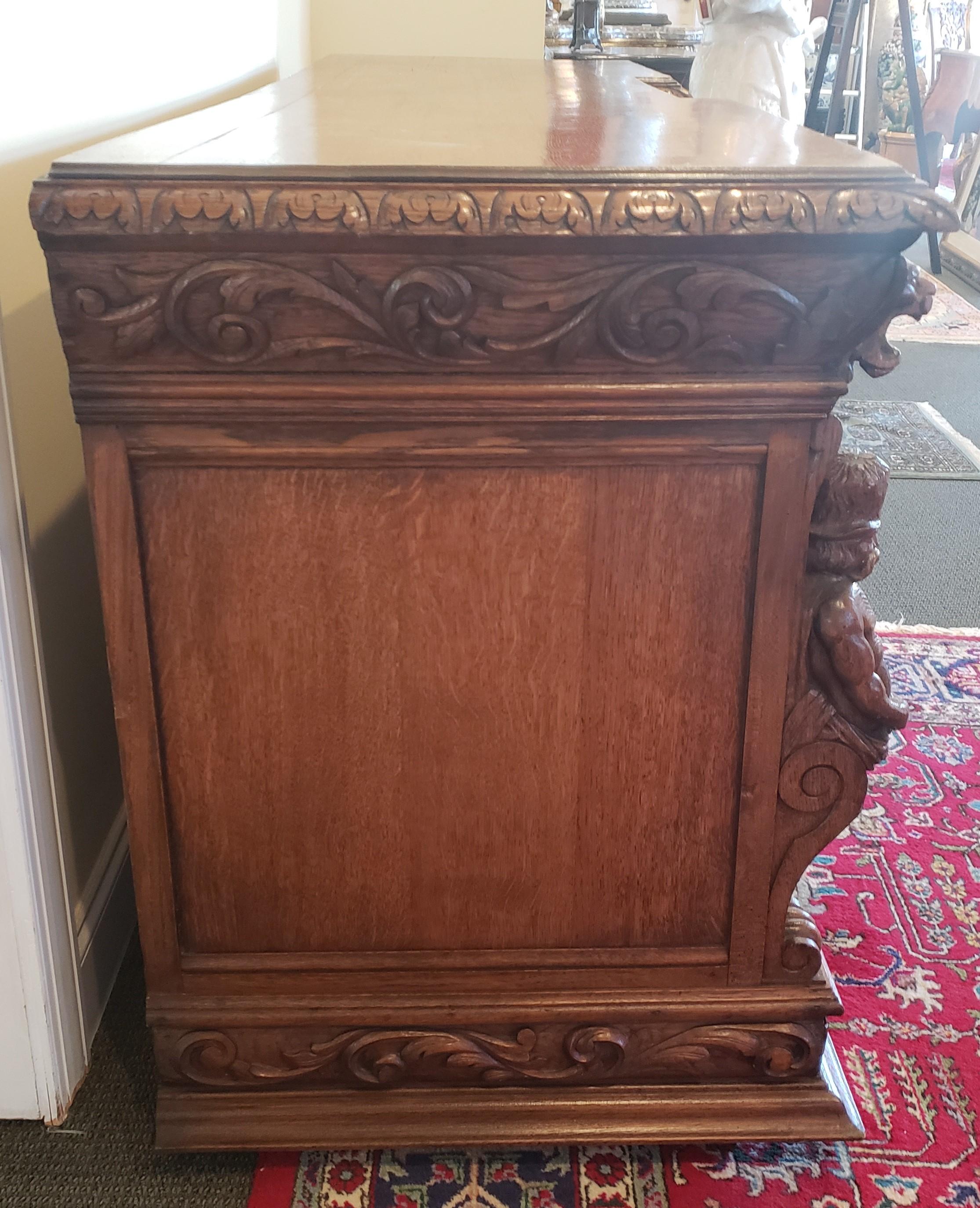 Carved English Victorian Oak Jacobean Style Credenza For Sale
