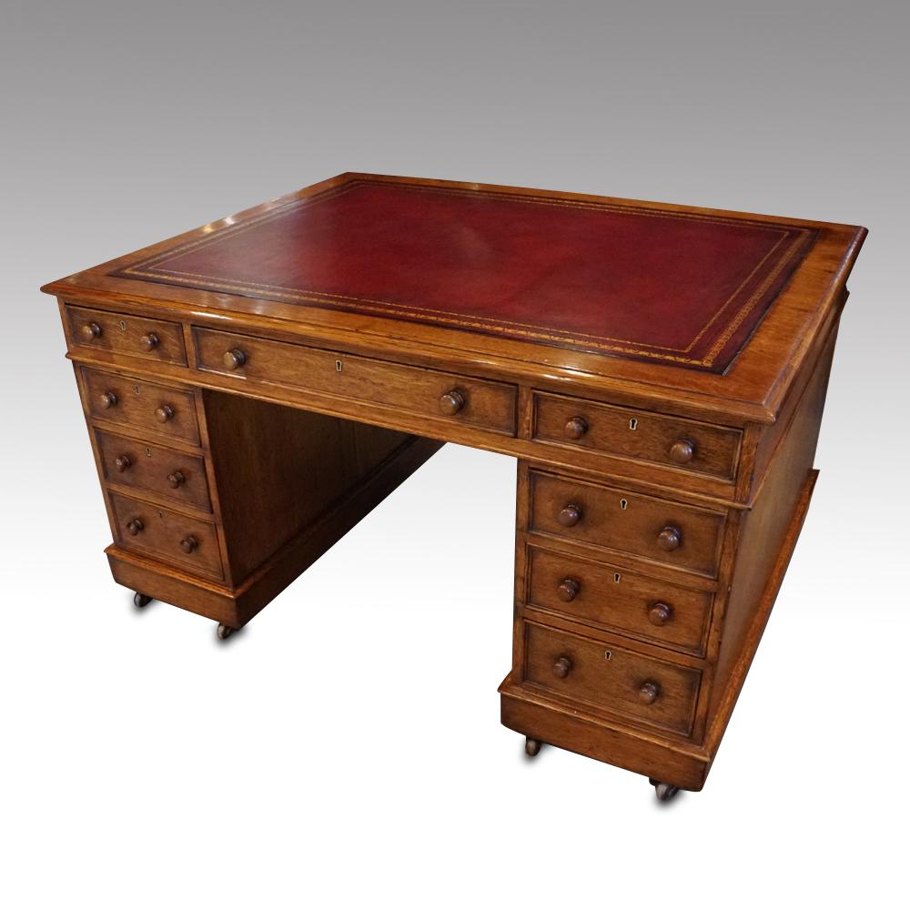 Victorian oak partners desk

This Victorian oak partners desk was made circa 1870. Purchased from a large county house near the River Test, in Hampshire, England famous for its trout fishing.
It is made in 3 parts, the top, and then the 2 pedestals.