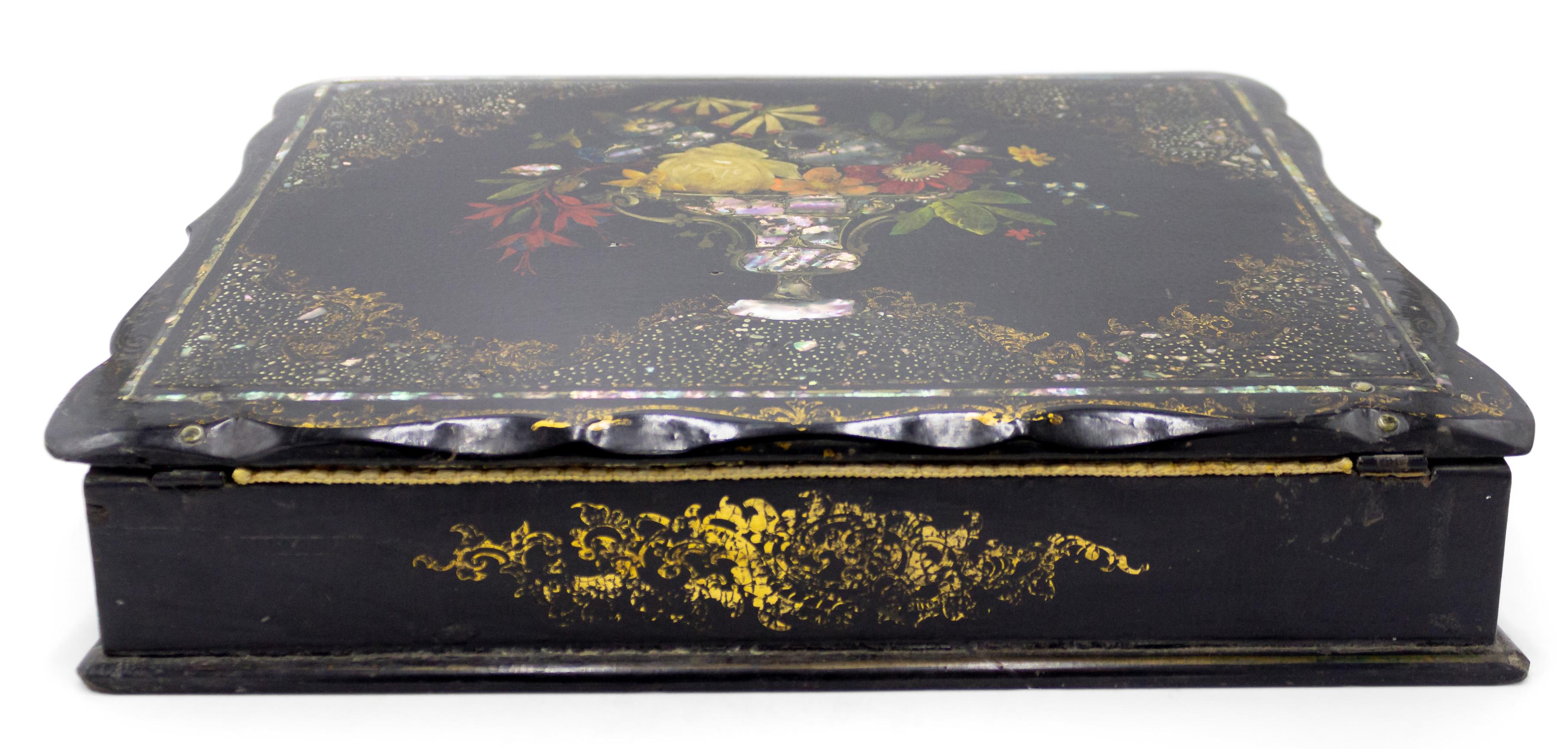English Victorian papier mache and gold inlaid decorated lap desk box with floral bouquet.
 