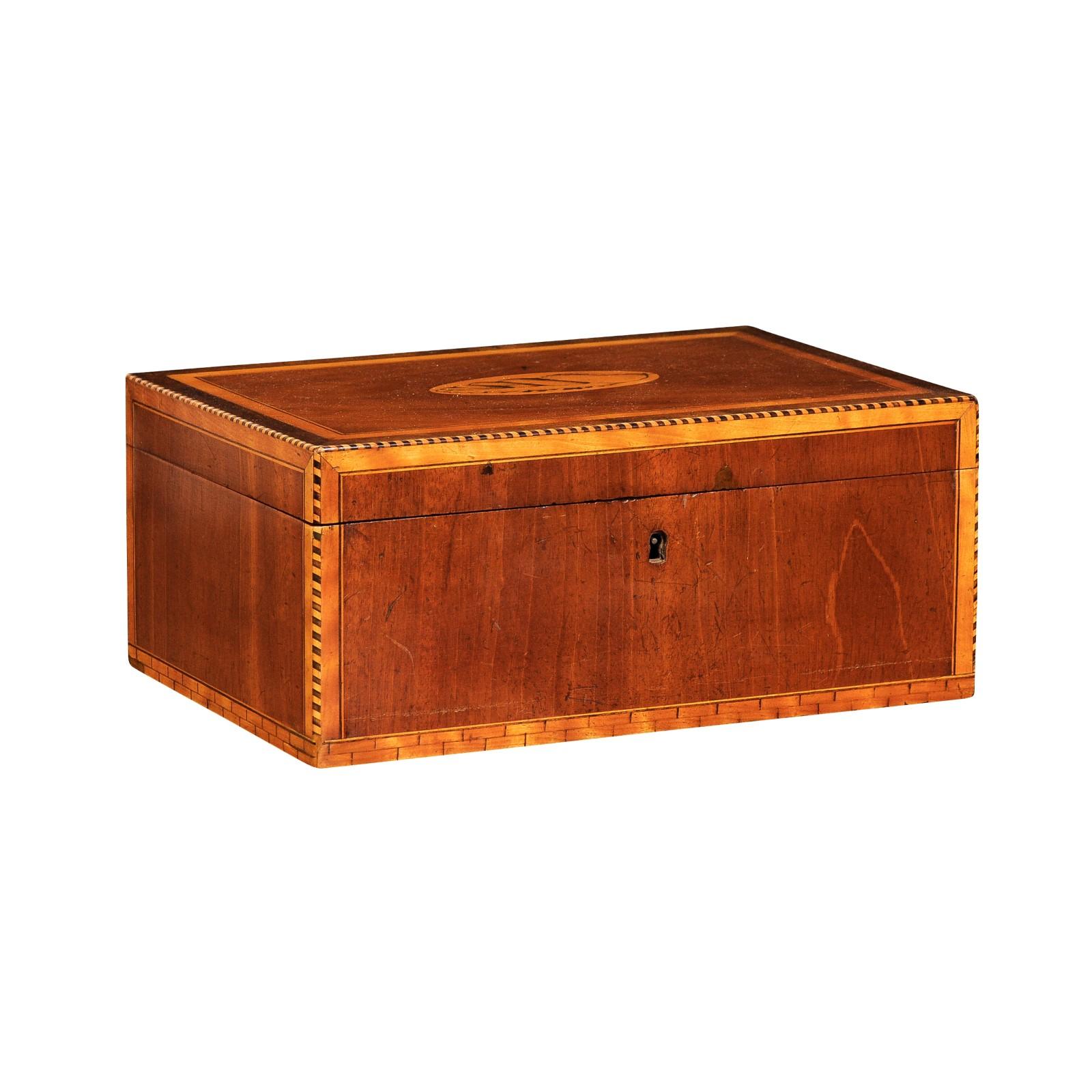 An English Victorian period ash or light walnut jewelry box from the 19th century with inlaid seashell motif. This English Victorian period jewelry box is a splendid exemplar of 19th-century craftsmanship, combining the subtle hues of ash or light
