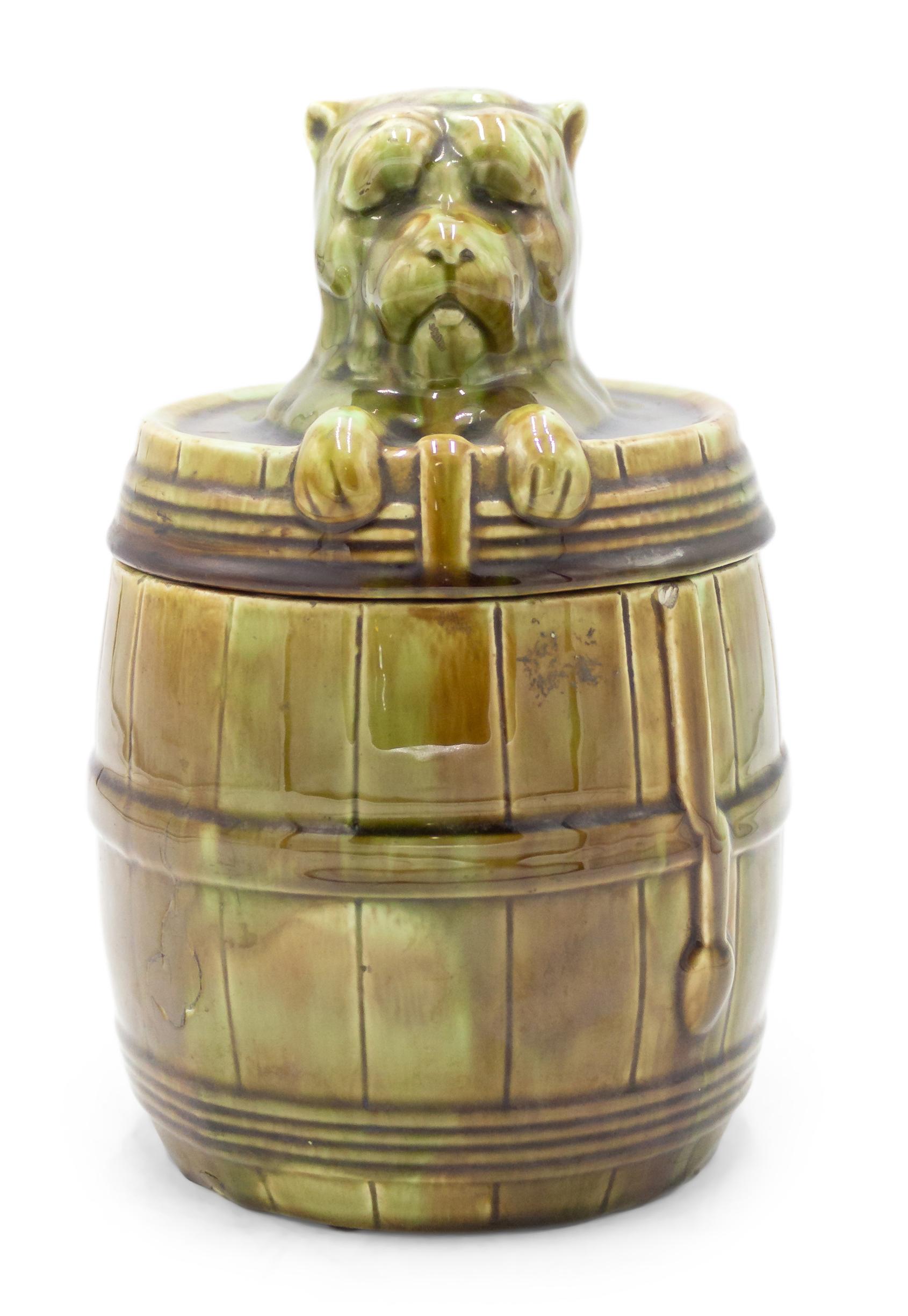 English Victorian green porcelain barrel design box with dog head on top.
 