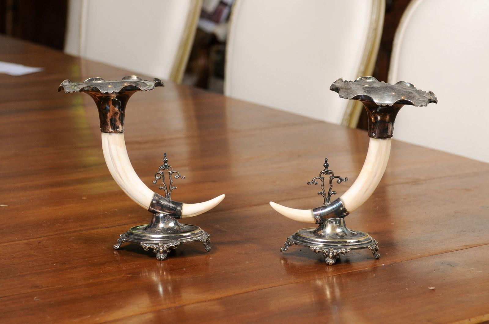 A pair of English Victorian period game animal horns on sheffield mounts from the 19th century stamped Joseph Rodgers & Sons. Created in England during the 19th century, each piece features a game animal Horn topped by a sheffield mount with