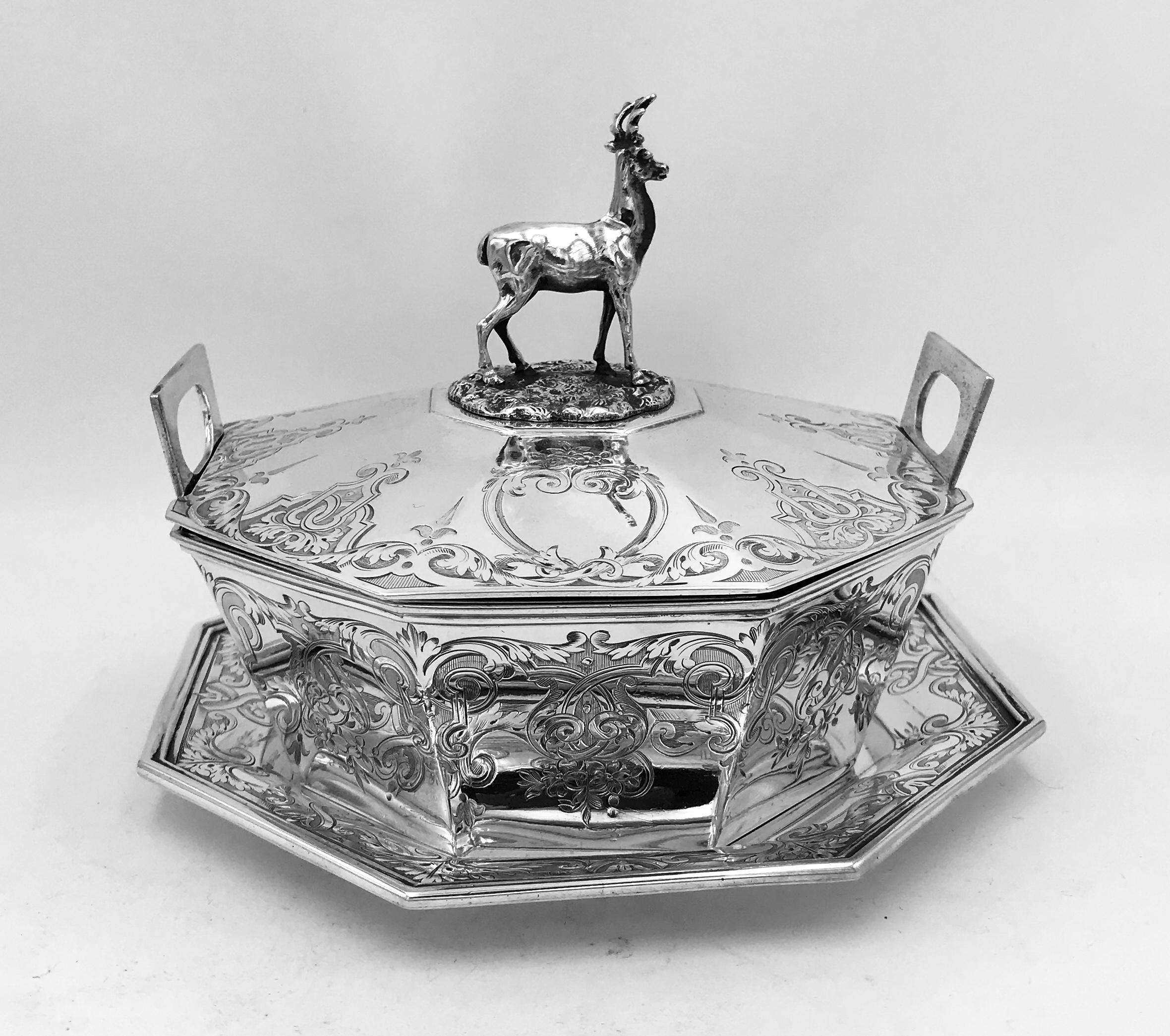 An English Victorian silver butter dish, cover and stand.
Beautifully engraved, this butter dish was made in London, 1855 by the famous Barnard Family.
The dish has a lovely stag finial on top.