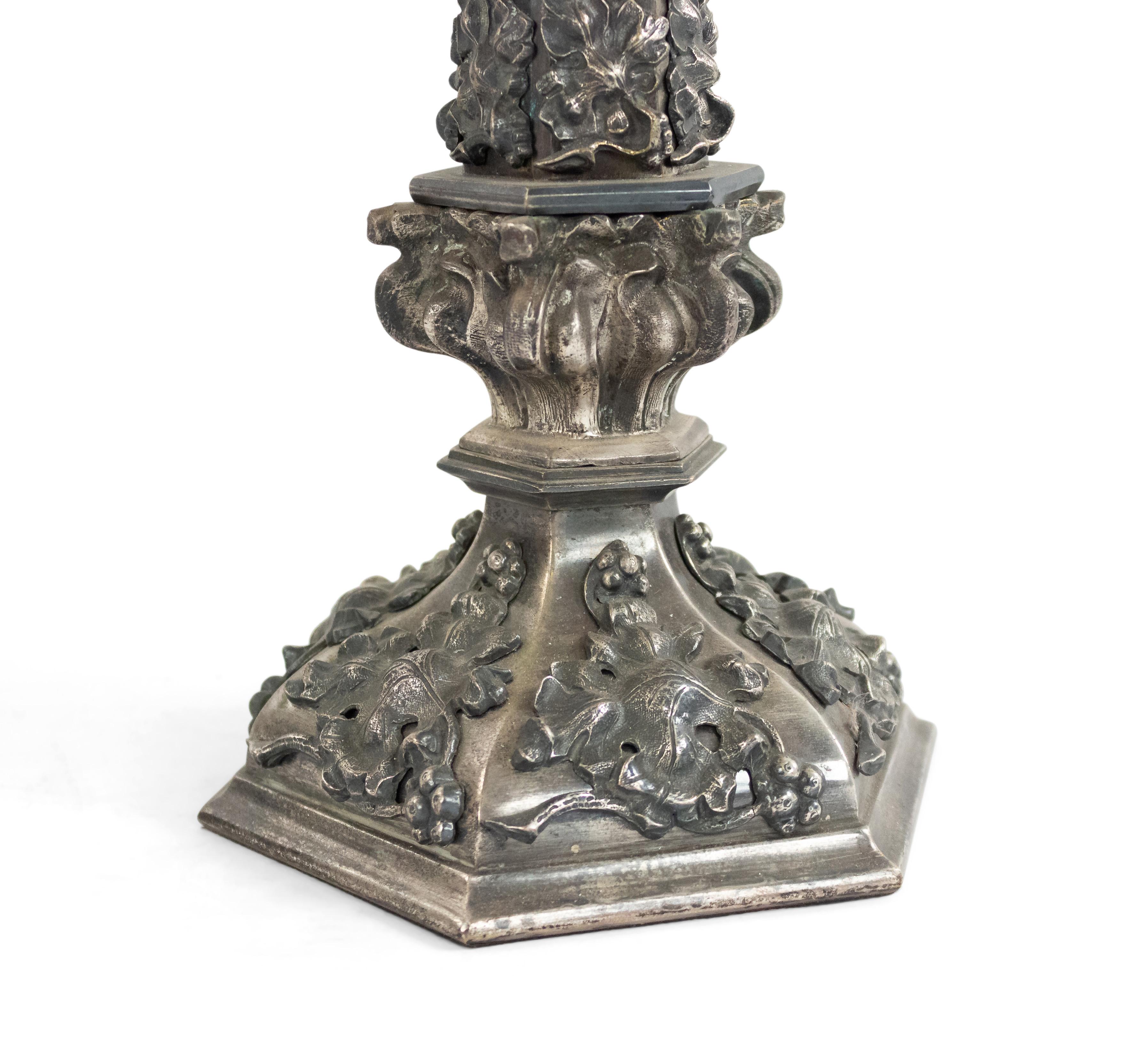 English Victorian silver plate 6 sided column form altar stick mounted as a table lamp with applied oak leaves and floral trim.