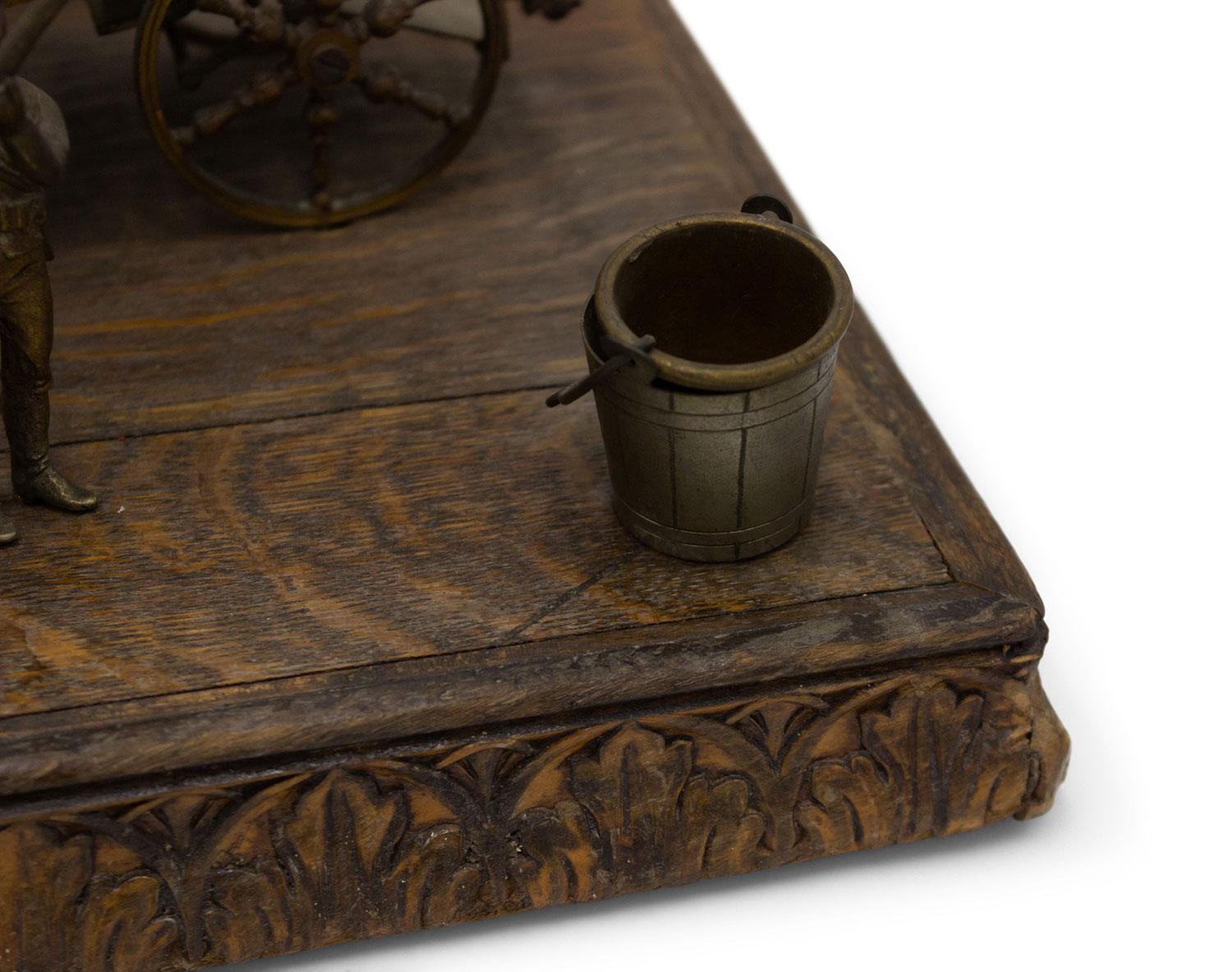 Britannico English Victorian Smoking Stand with Carriage Figure in vendita