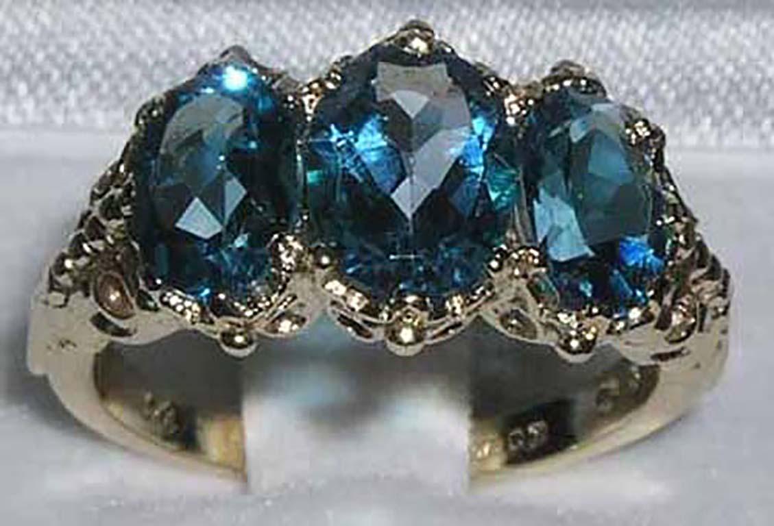 For Sale:  English Victorian Style 14K Yellow Gold Total 3ct Blue Topaz Trilogy Ring 2