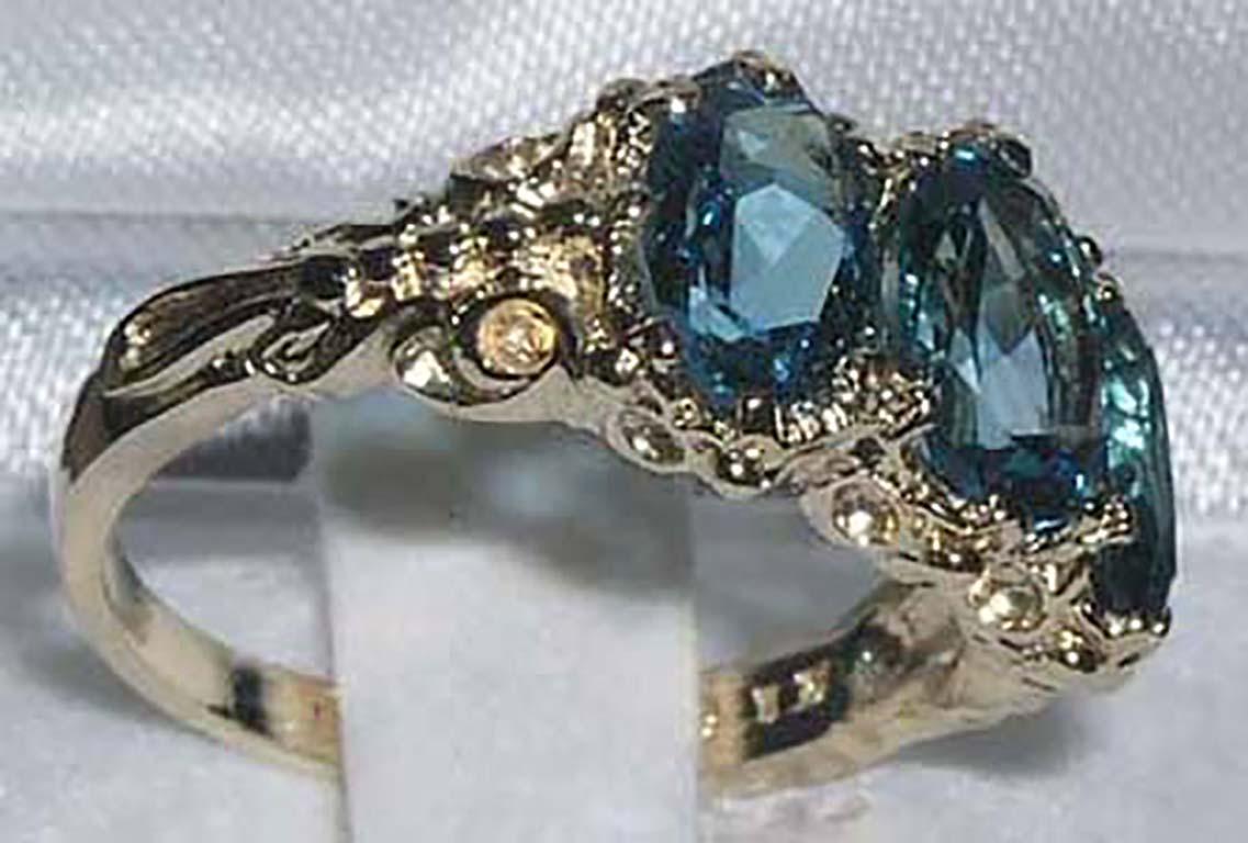 For Sale:  English Victorian Style 14K Yellow Gold Total 3ct Blue Topaz Trilogy Ring 3