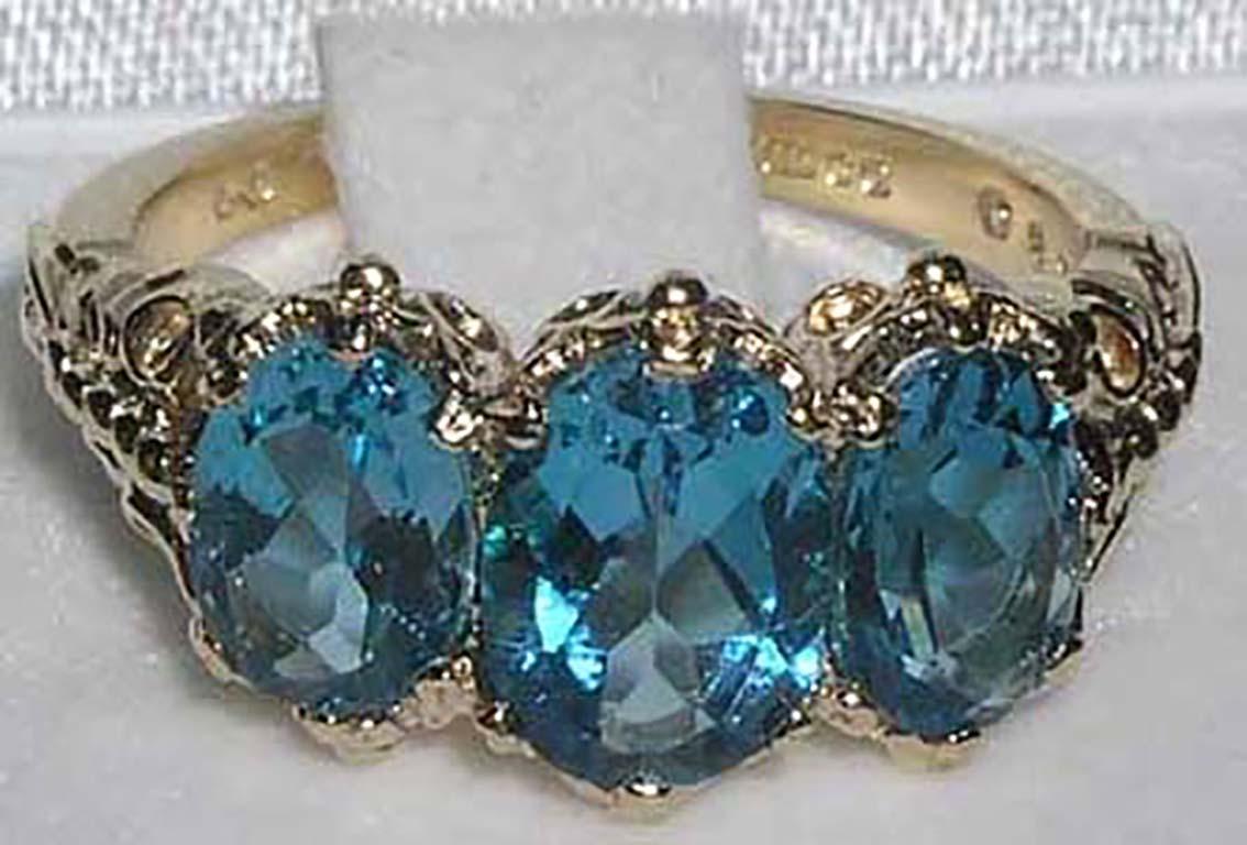 For Sale:  English Victorian Style 14K Yellow Gold Total 3ct Blue Topaz Trilogy Ring 4