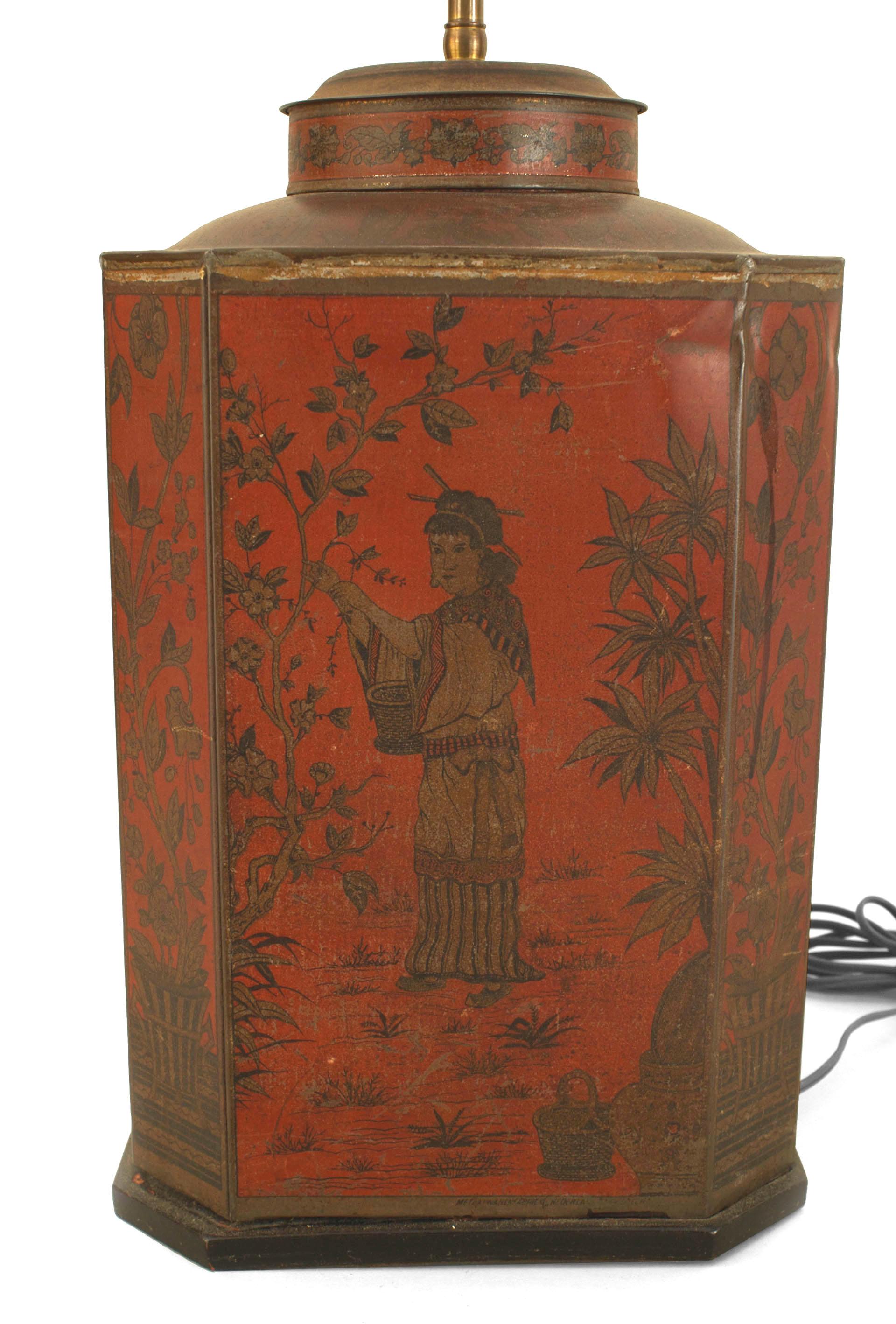 English Victorian style (20th Century) square shaped red tole and Chinoiserie decorated tea canister mounted as a lamp.
 
Ships without a shade