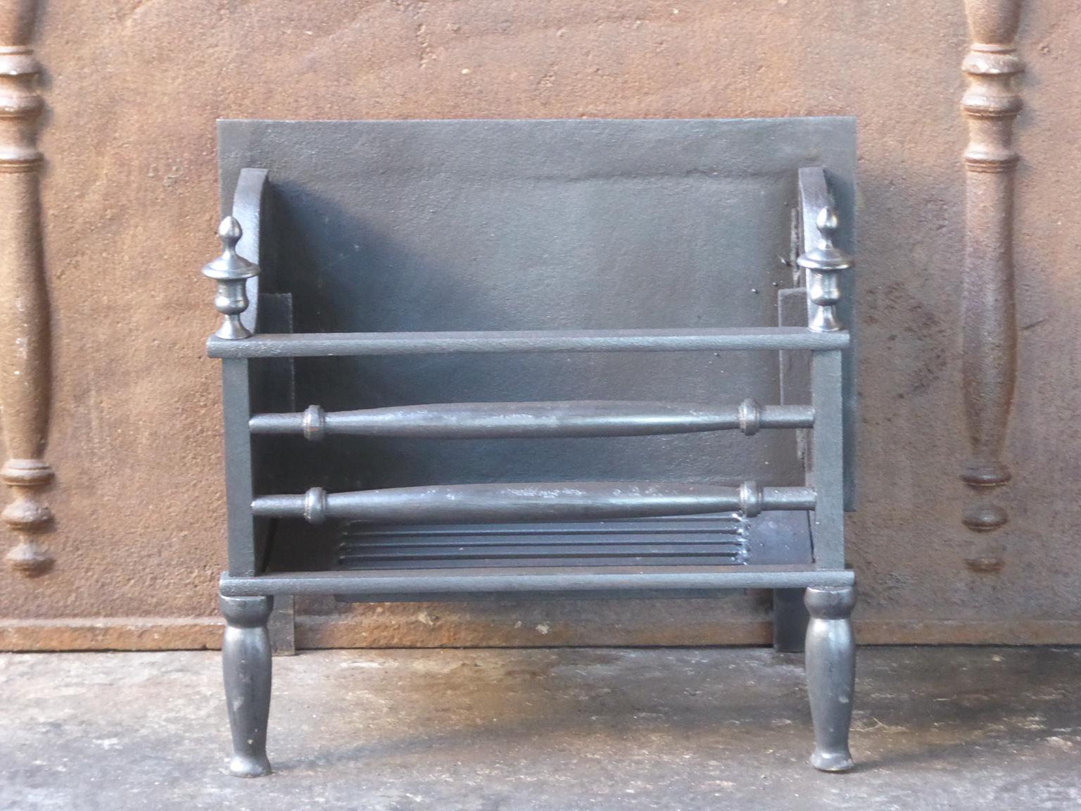 English Victorian style fireplace basket or fire basket. The fireplace grate is made of wrought iron and cast iron. 


















