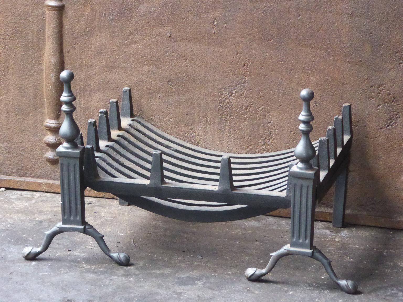 English Victorian style fireplace basket or fire basket. The fireplace grate is made of wrought iron, cast iron and brass. The total width of the front of the grate is 25.6 inch (65 cm).

















 
