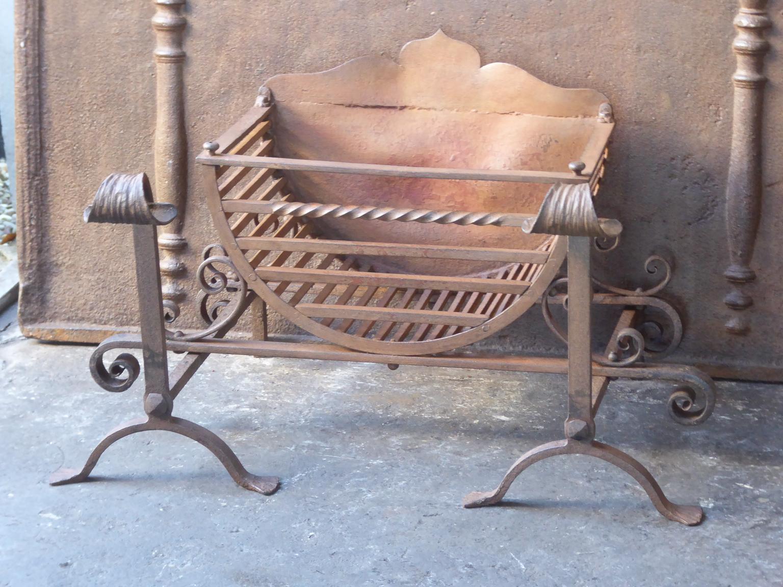 English Victorian style fireplace basket or fire basket. The fireplace grate is made of wrought iron. The grate has a natural brown patina. Upon request it can be made black. The total width of the front of the grate is 29 inch (74 cm).

The