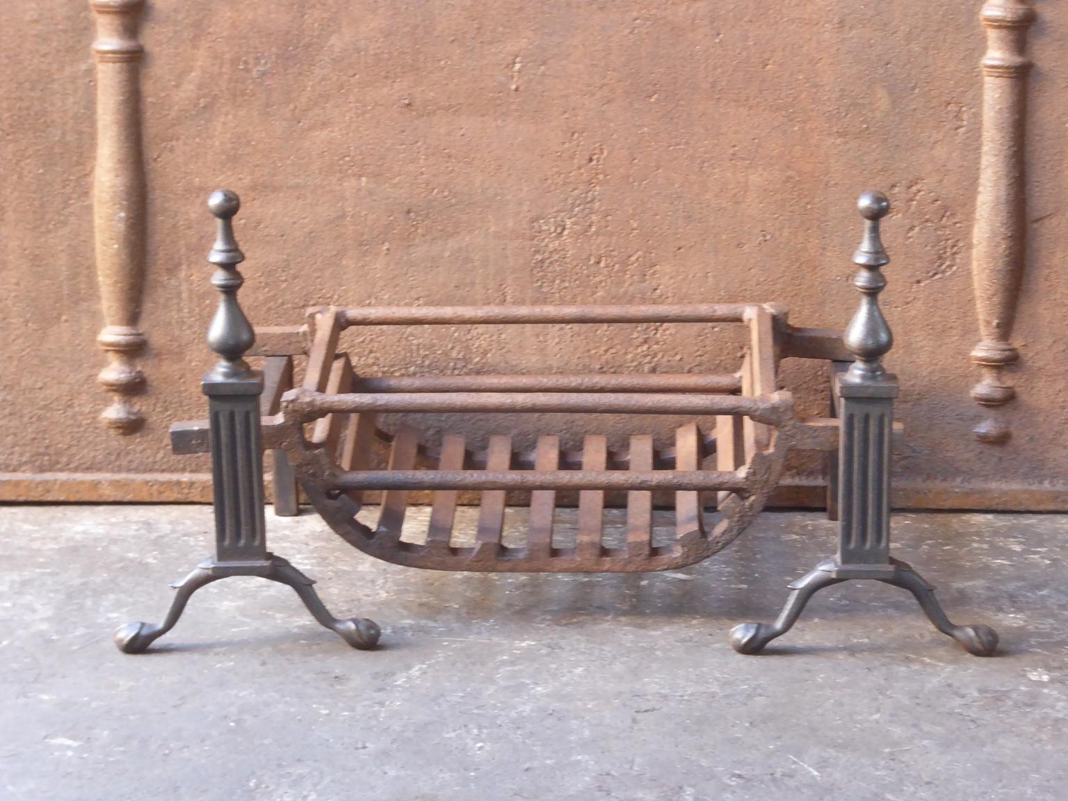 English Victorian style fireplace basket or fire basket. The fireplace grate is made of wrought iron and cast iron. The grate has a natural brown patina. Upon request it can be made black. The total width of the front of the grate is 27 inch (68